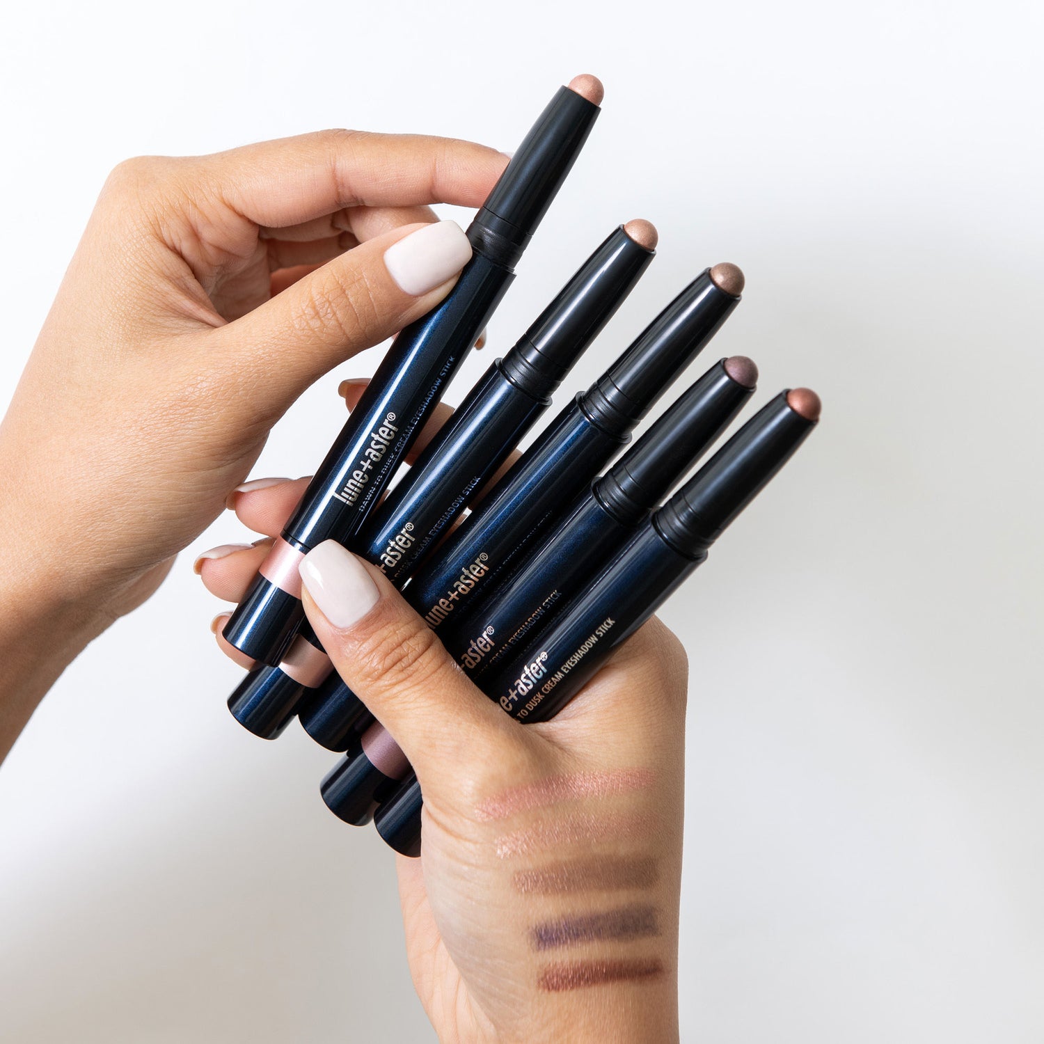 Group swatch image of Lune+Aster Dawn to Dusk Cream Eyeshadow Stick