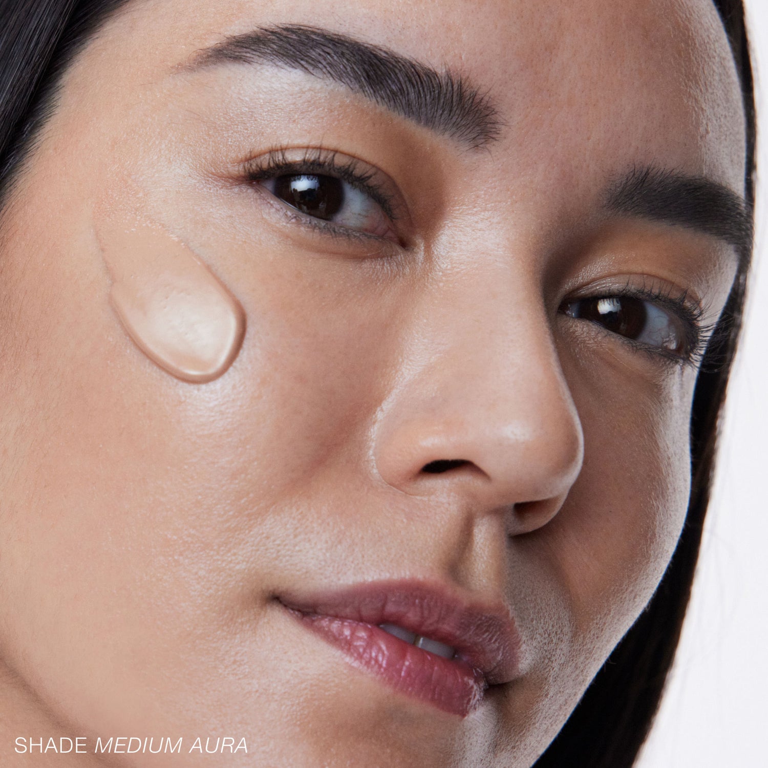 Model image of RMS Beauty SuperNatural Radiance Serum Broad Spectrum SPF 30 variant: Light Aura