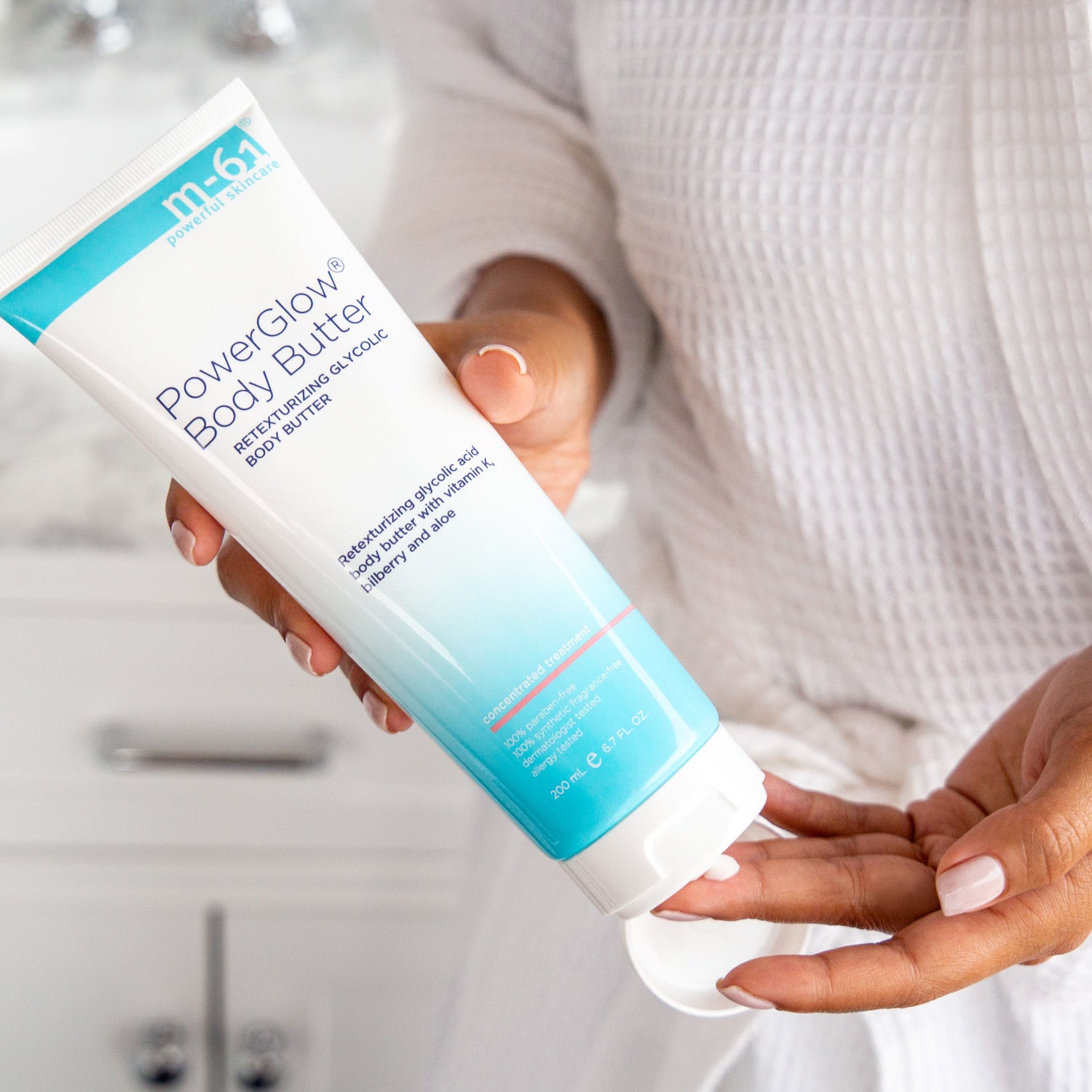 Lifestyle image of M-61 PowerGlow Body Butter variant: 6.7 fl oz