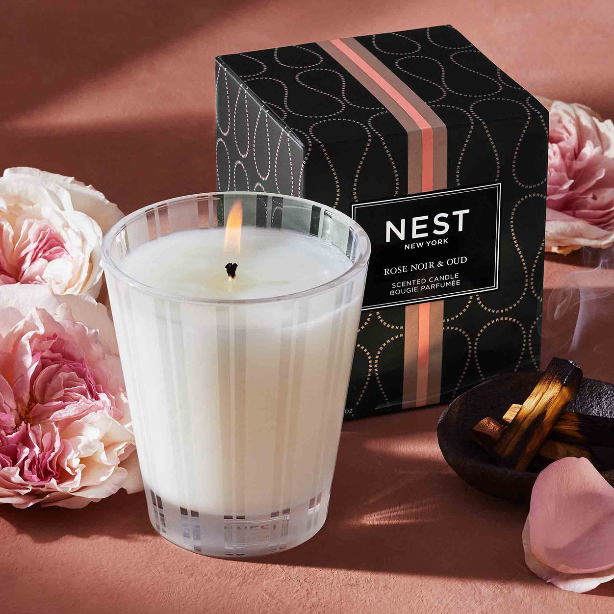 Lifestyle image of Nest Rose Noir and Oud Candle variant: 8.1 oz (Classic)
