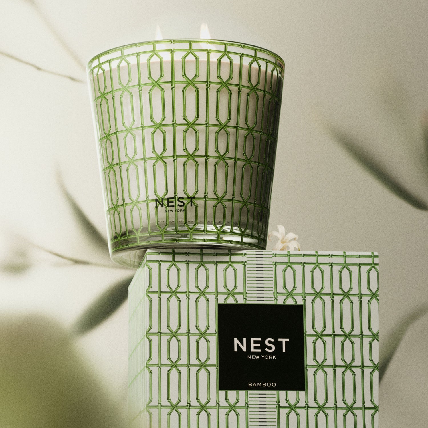 Lifestyle image of Nest Bamboo Decorative Candle variant: 21.2 oz (3-Wick)