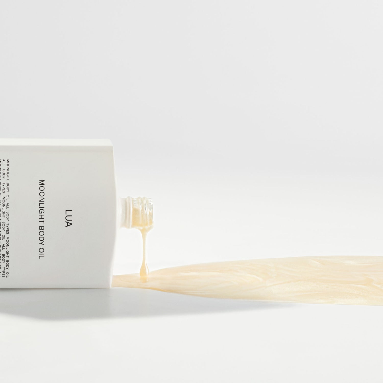 Lifestyle image of Costa Brazil Lua Moonlight Body Oil variant: 3.4 fl oz