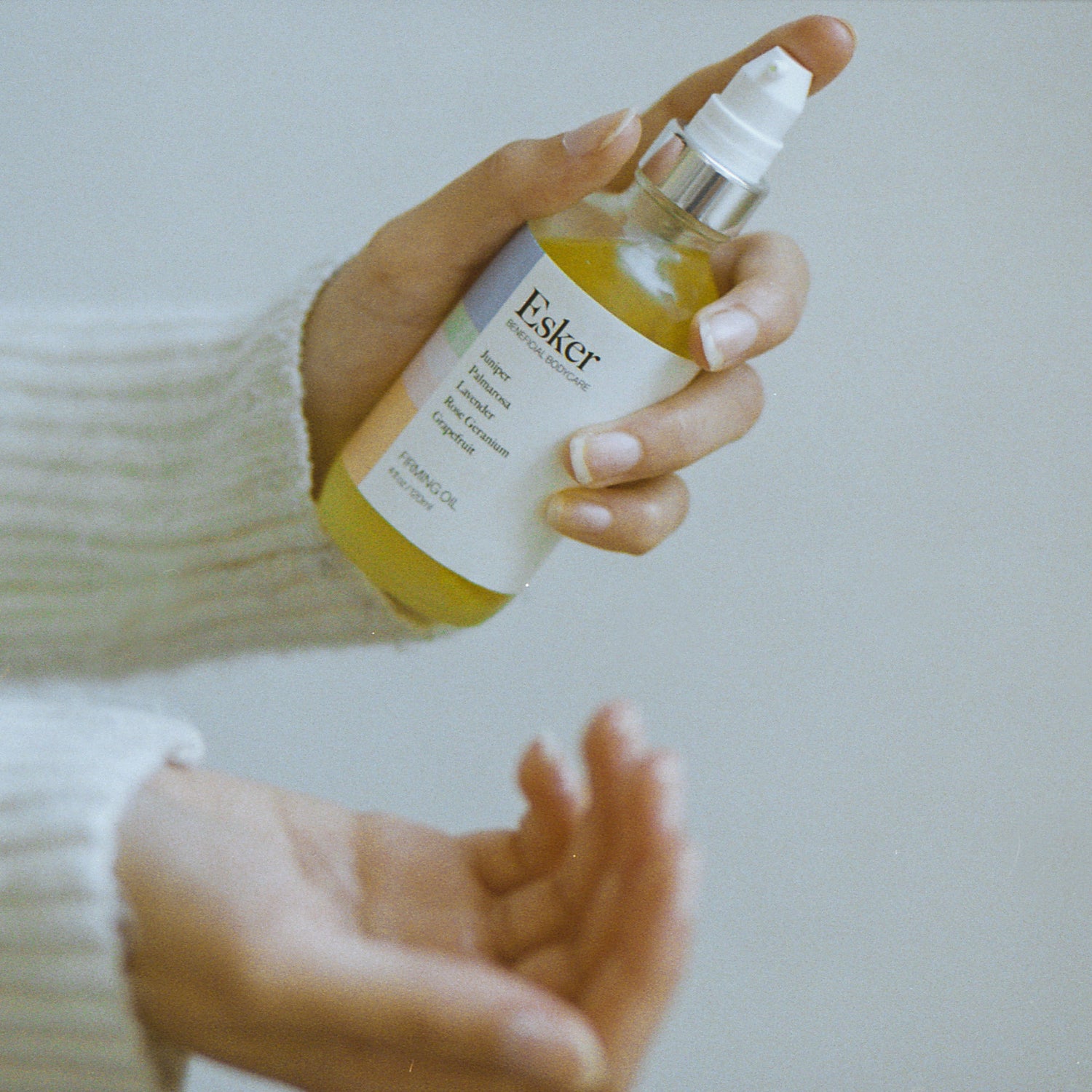 Lifestyle image of Esker Firming Oil variant: 2 fl oz