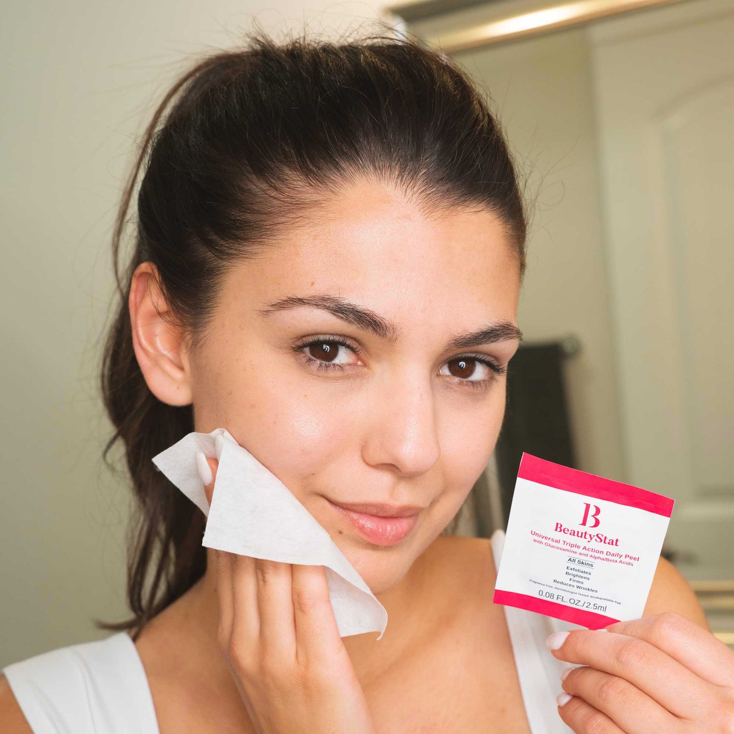 Lifestyle image of BeautyStat Universal Triple Action Daily Peel with Glucosamine and AHAs/BHAs variant: 10 Treatments
