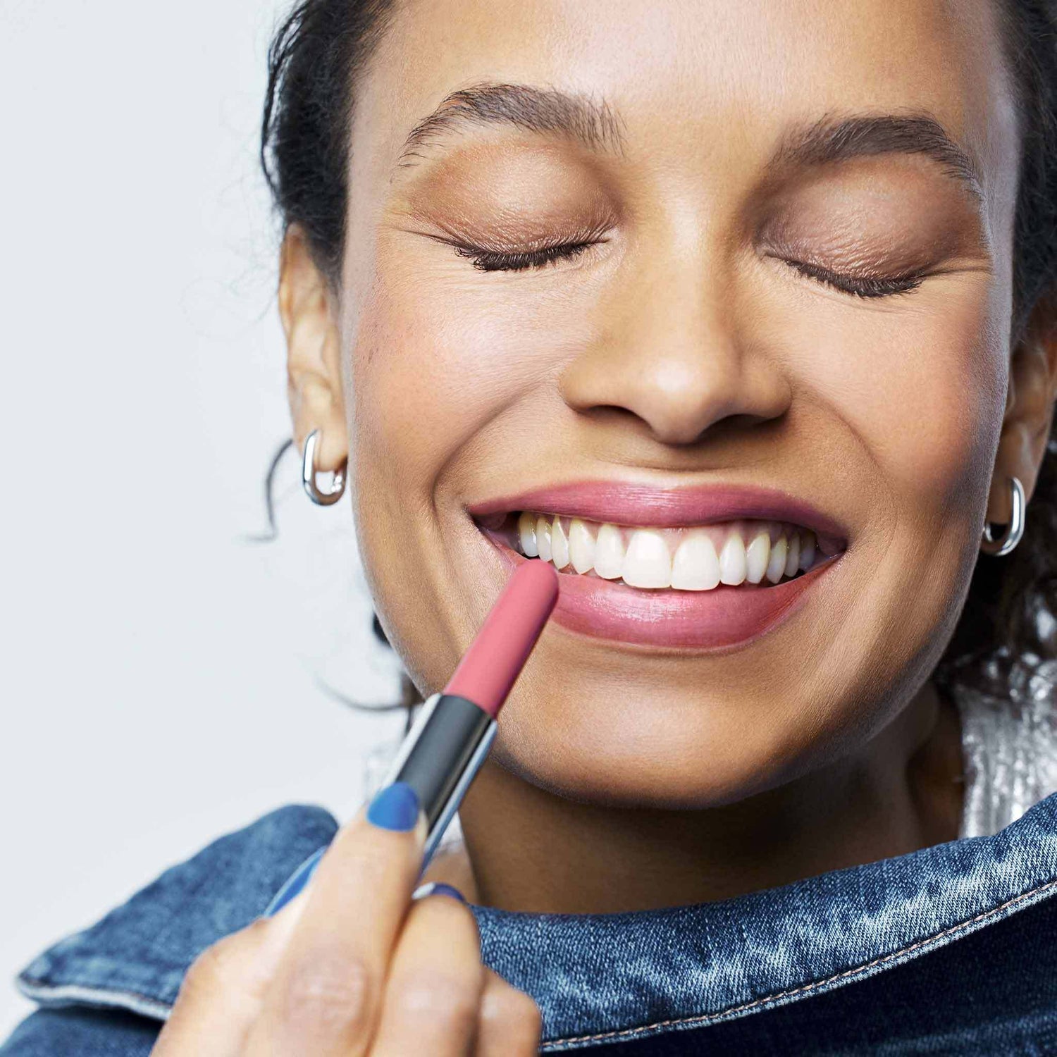 Lune+Aster Lip Glide Color/Shade variant: Poppy lifestyle image 4 . This product is in the color berry