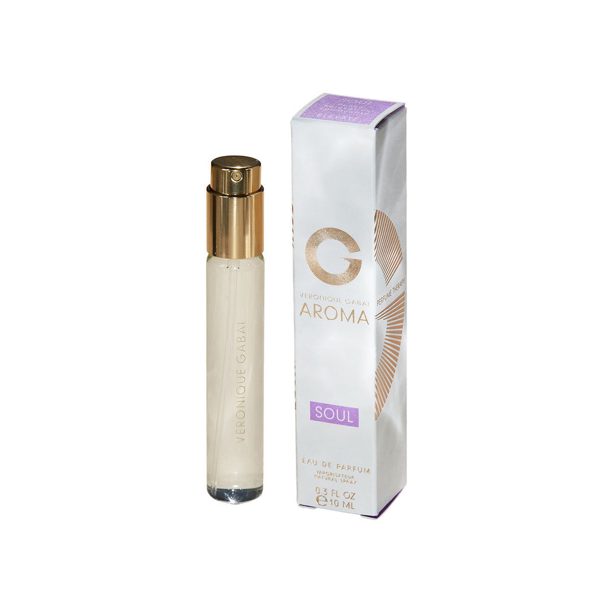 A small, cylindrical Aroma Soul Eau de Parfum vial with a gold cap sits next to its white and lavender rectangular box, evoking a sense of peace and relaxation.