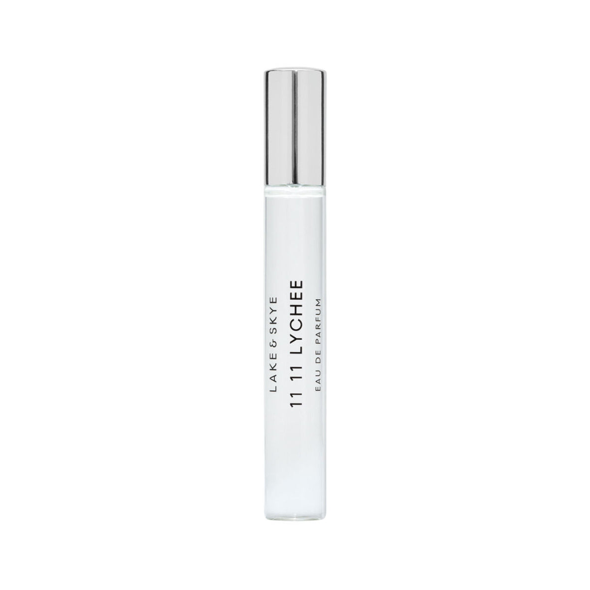 A slender glass Lake & Skye 11 11 Lychee Eau de Parfum rollerball with a silver cap and a label listing notes of lychee and ambrette seed.