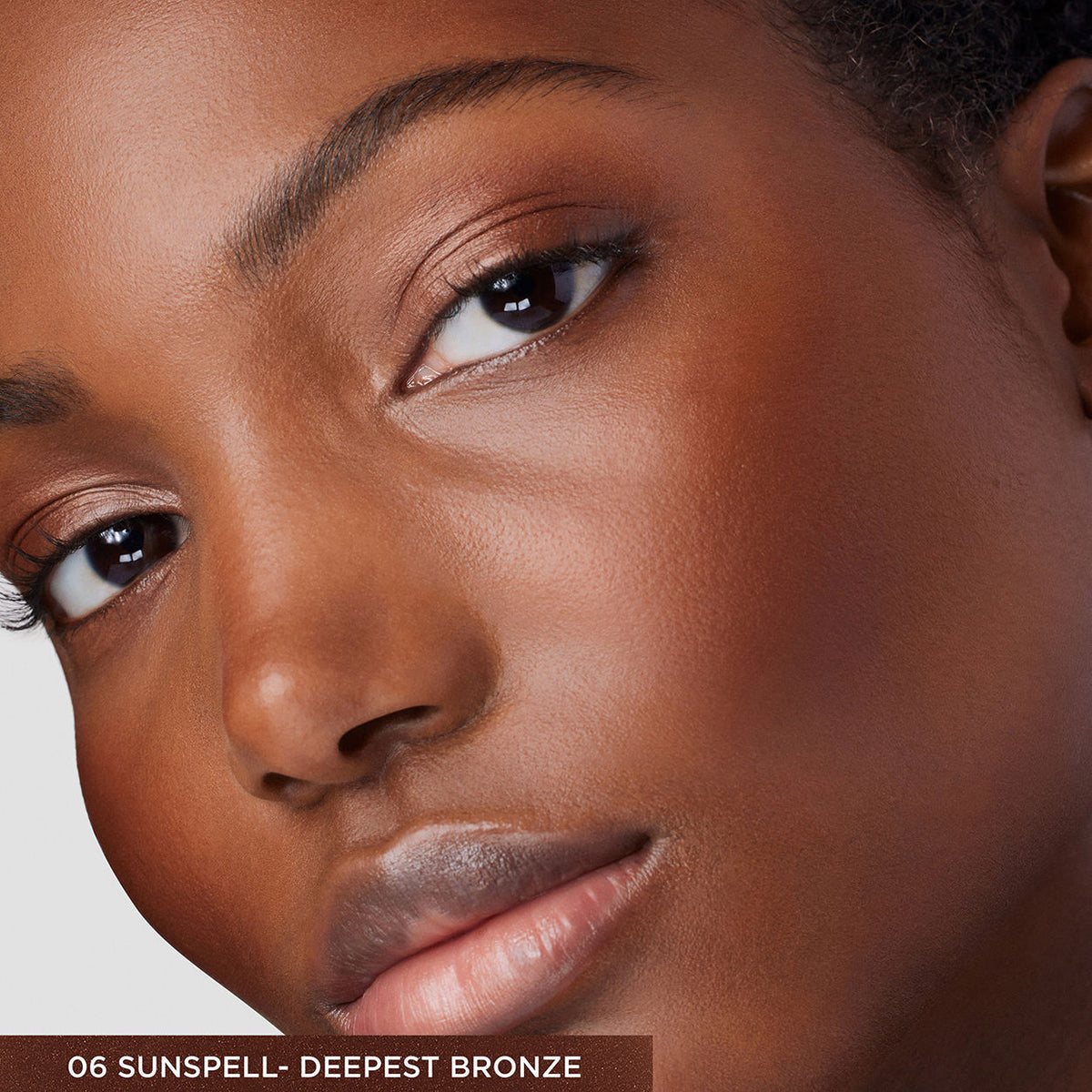 Model image of Laura Mercier Tinted Moisturizer Bronzer variant: 06 Sunspell