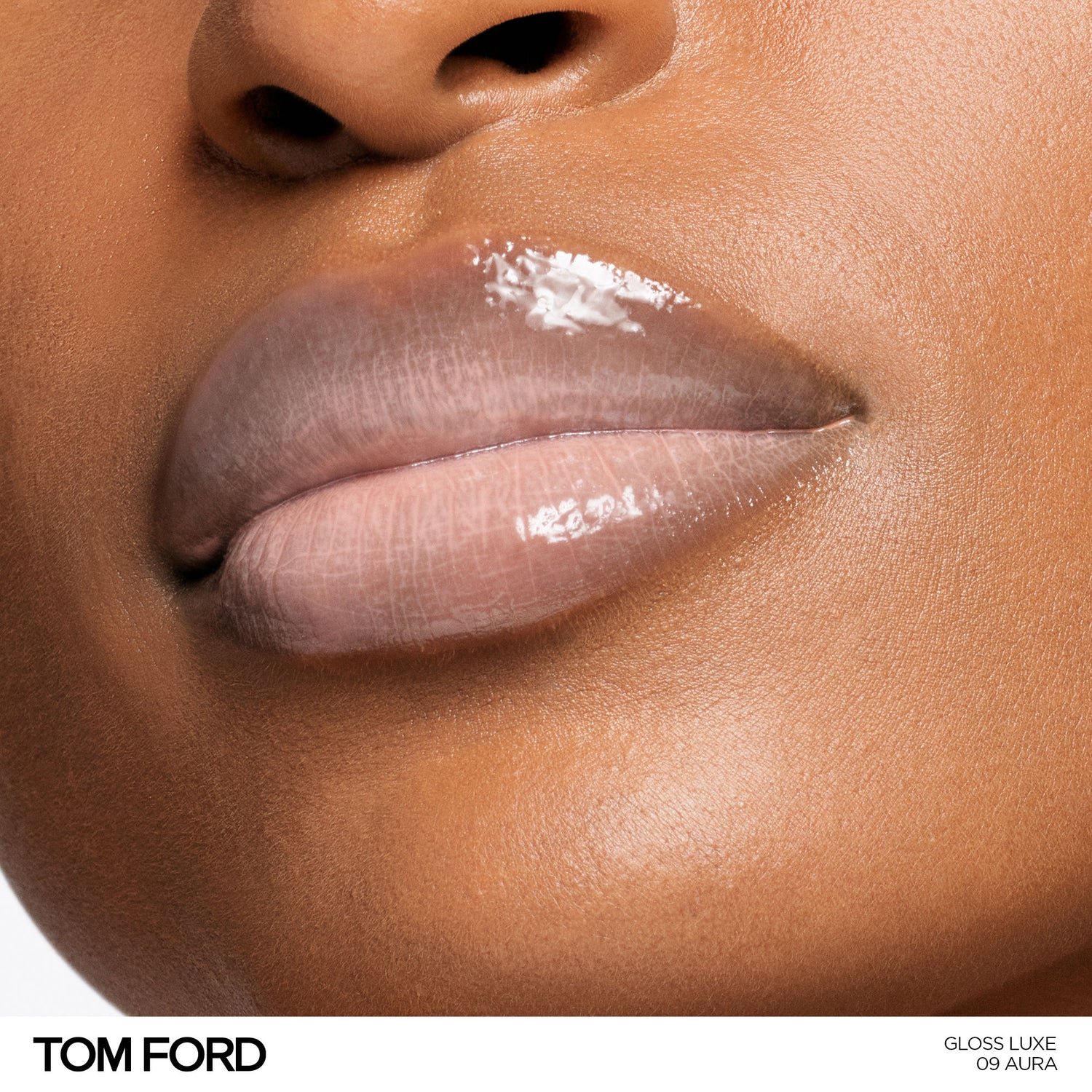 Model image of Tom Ford Gloss Luxe Lip with Hydrating Jojoba Oil variant: 09 Aura