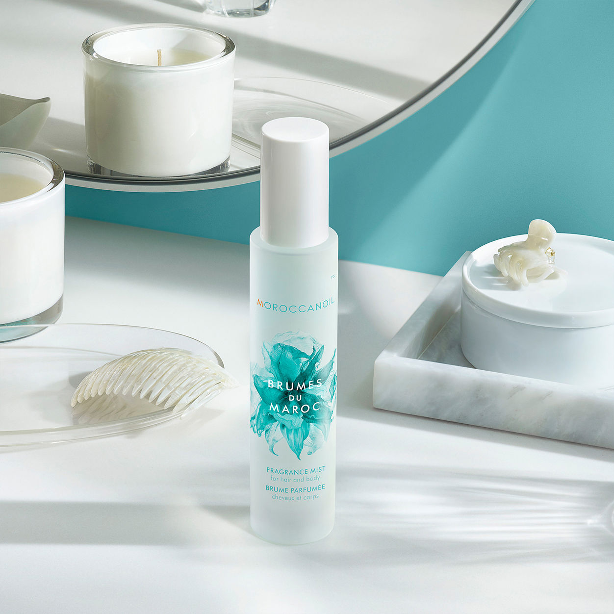 Lifestyle image of Moroccanoil Hair and Body Fragrance Mist variant: 3.4 fl oz