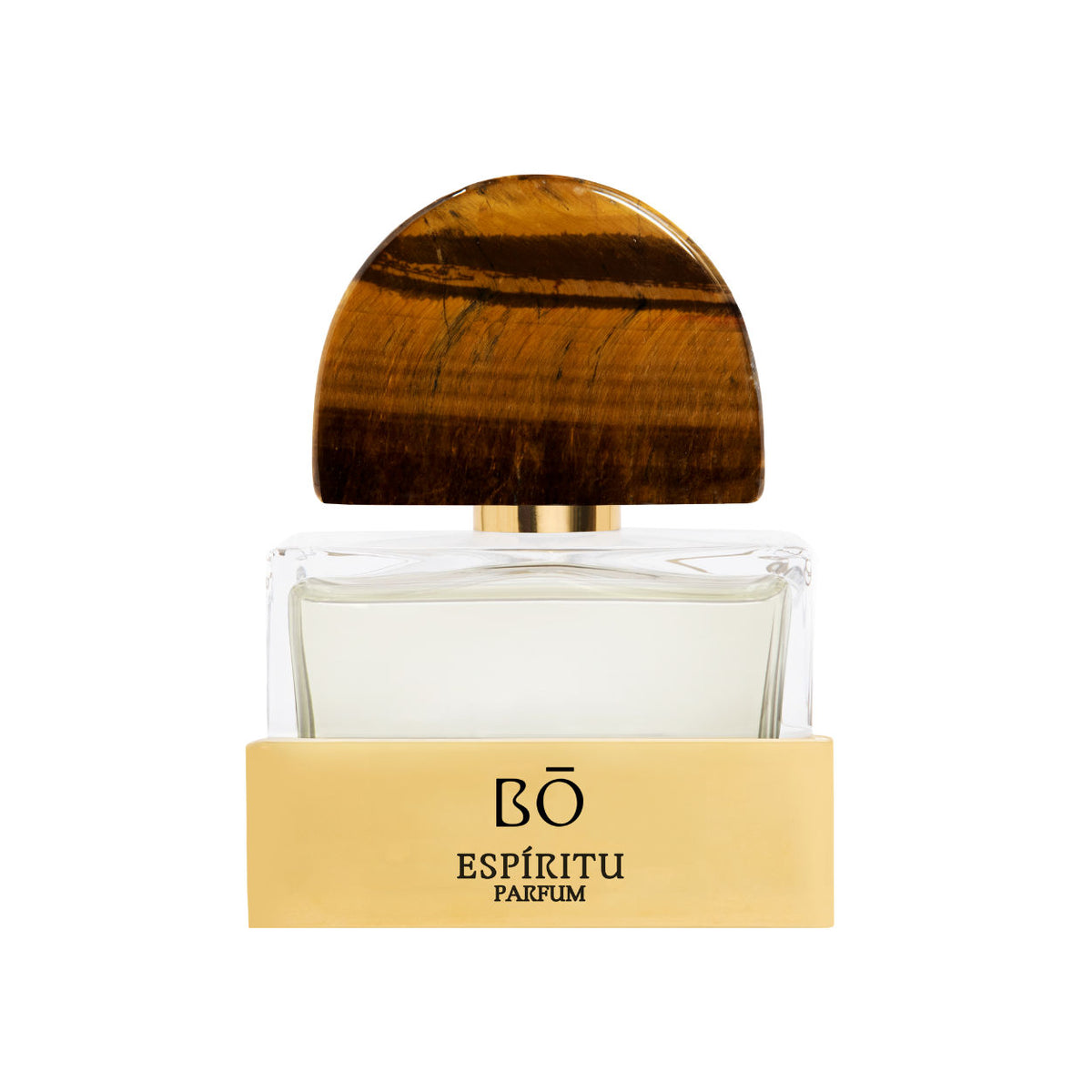 A rectangular glass bottle of Bō Espíritu Parfum featuring cozy musks, with a semi-circular, brown-striped stone cap and a gold-colored base.
