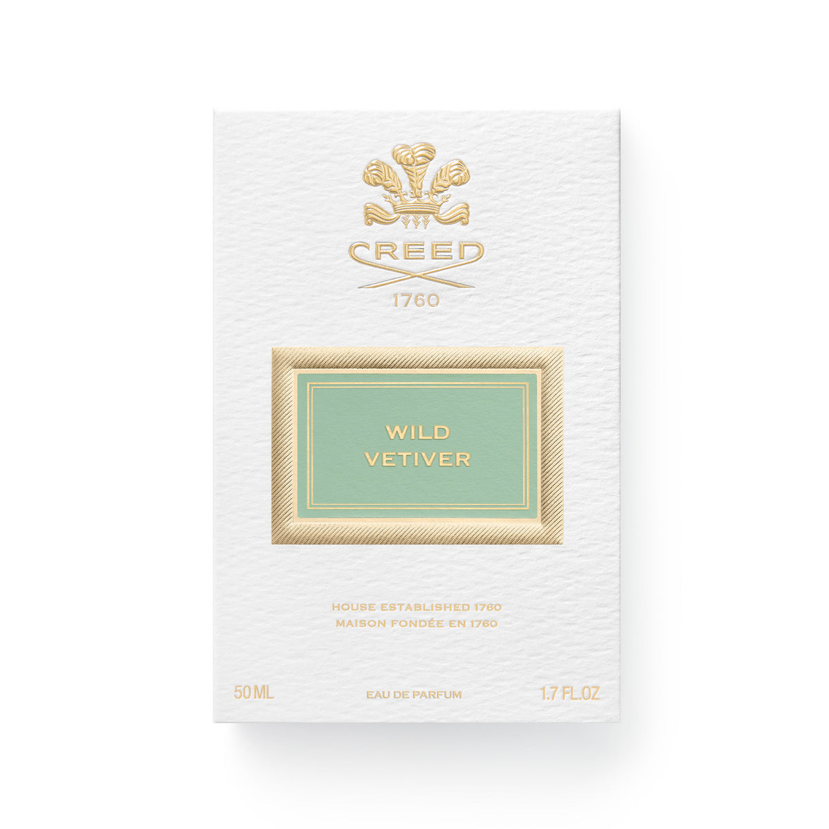 White rectangular box for Wild Vetiver Eau de Parfum by Creed, featuring a gold crest, a sage green label with the fragrance name, and details indicating a 50 ml, 1.7 fl. oz. volume.