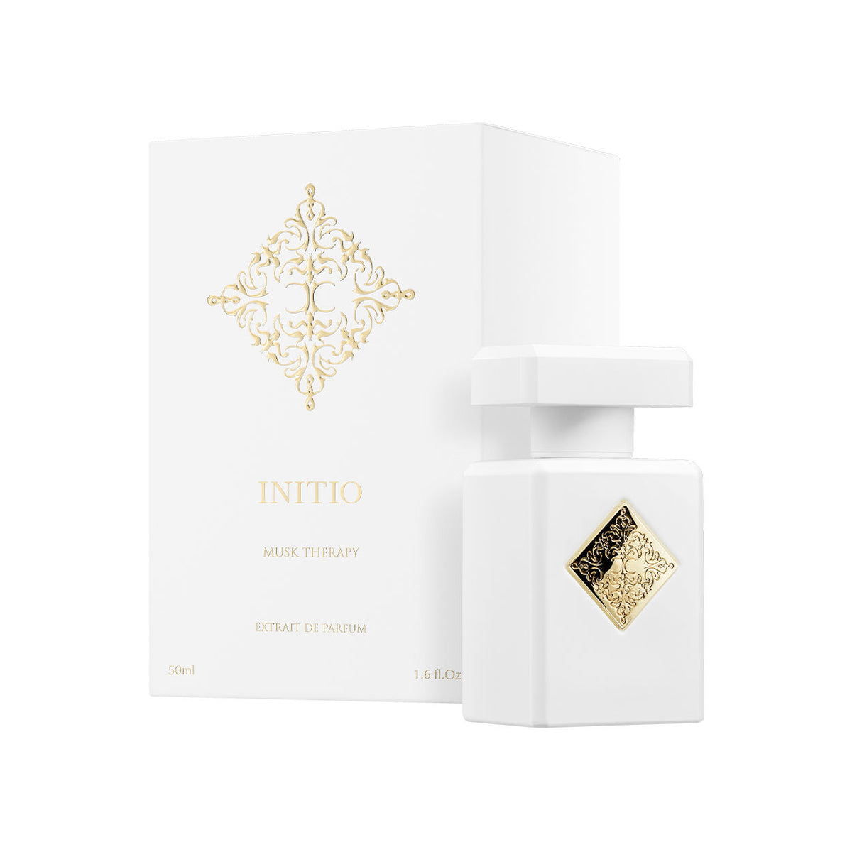 White Musk Therapy Extrait de Parfum bottle with a gold emblem standing next to its matching white box.