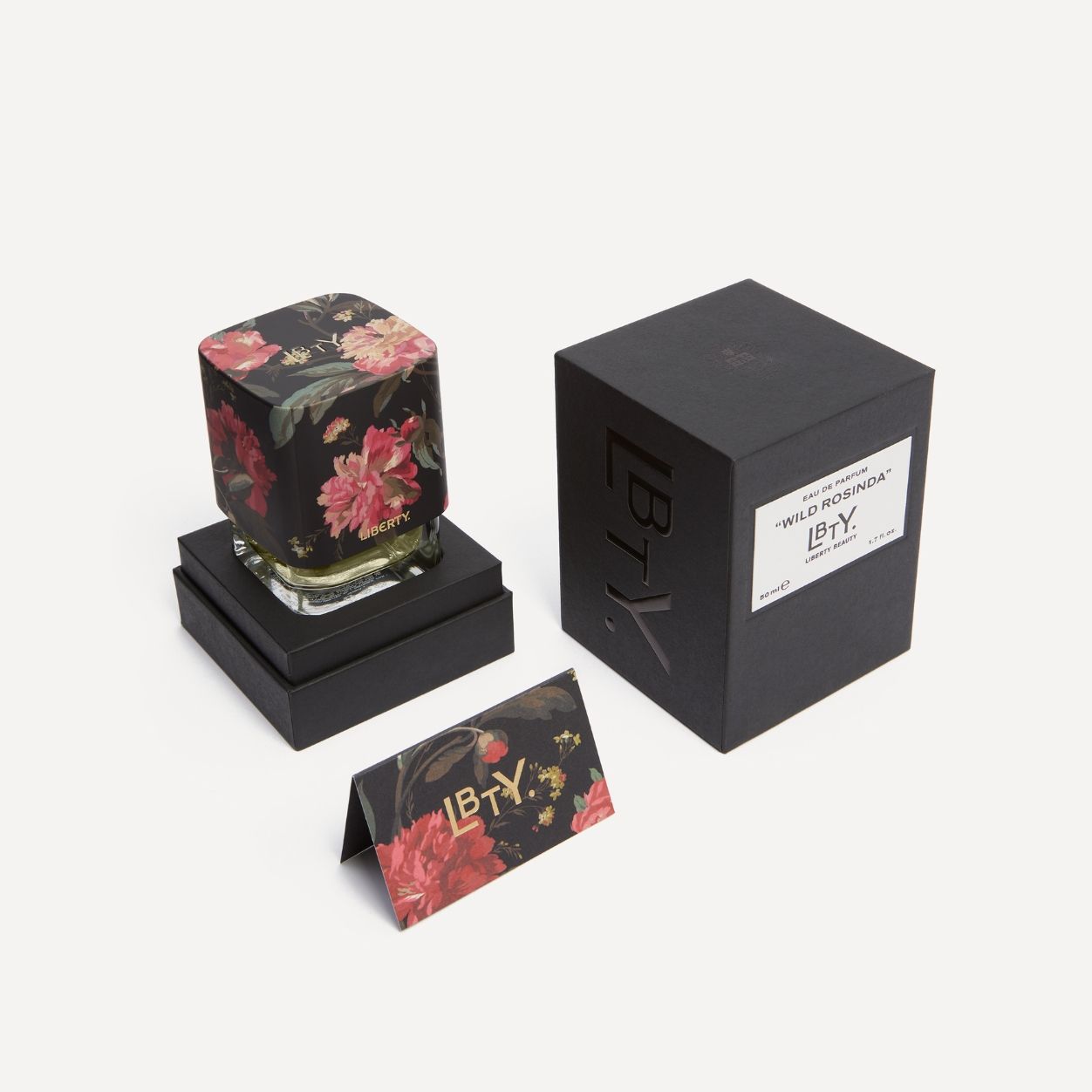 Image of an open Liberty LBTY. Wild Rosinda Eau De Parfum variant: 1.69 fl oz