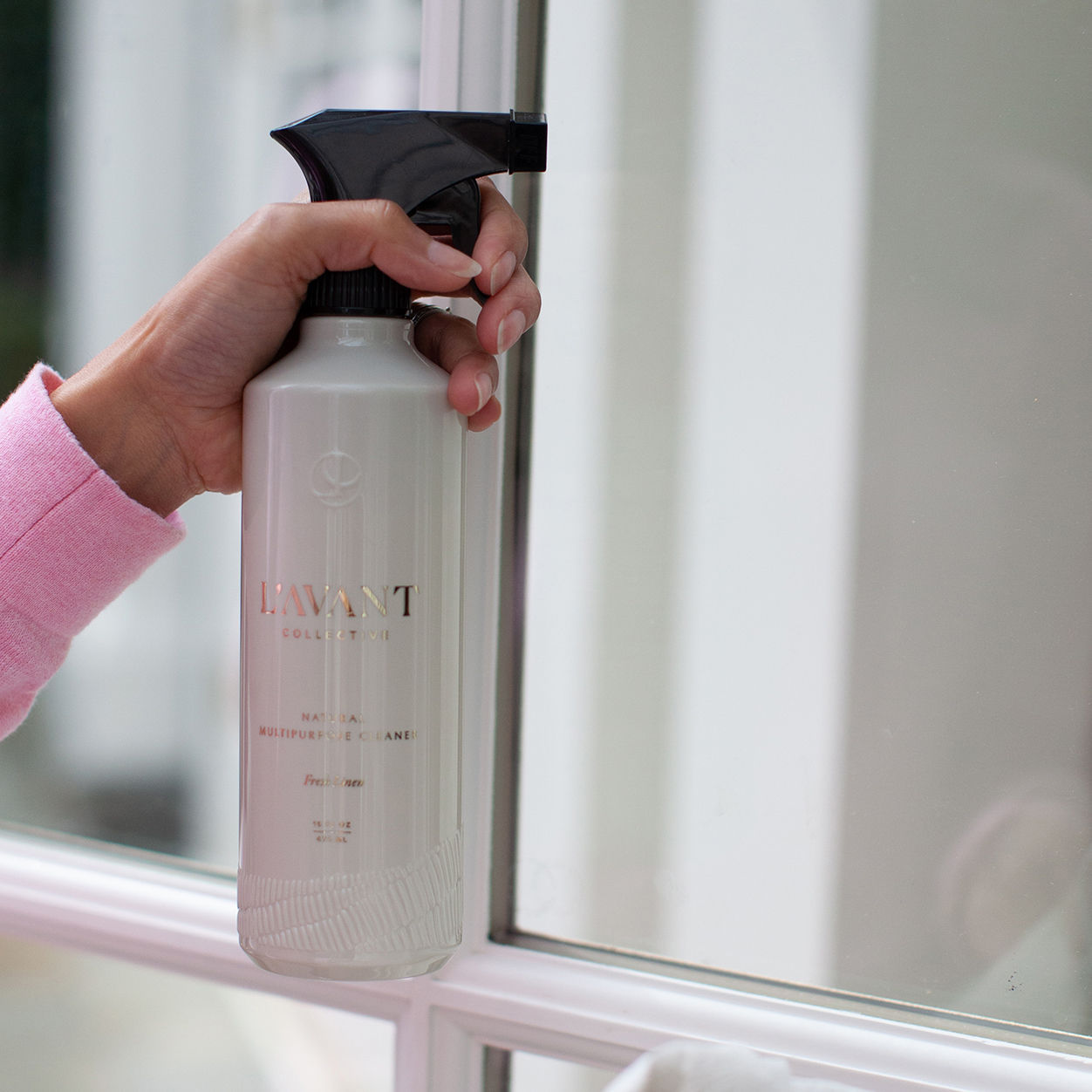 Model image of L’Avant Collective Fresh Linen Multipurpose Cleaner variant: 16 oz