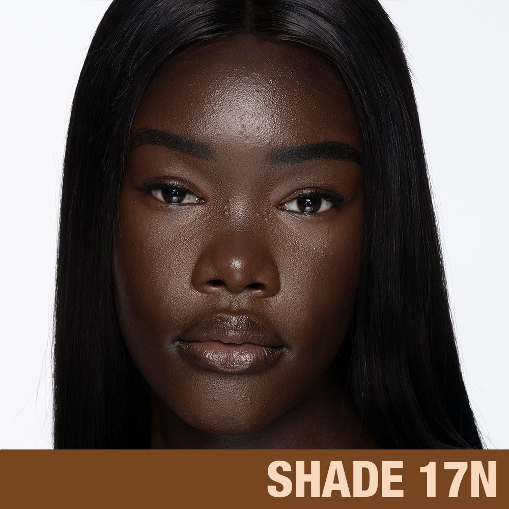 Model image of Charlotte Tilbury Charlotte's Beautiful Skin Foundation variant: 17 Neutral (deepest with neutral undertones)