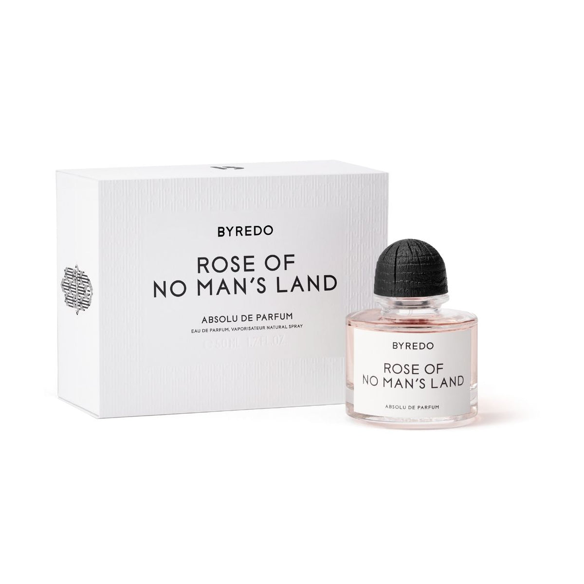 A rectangular white box next to a glass bottle of light pink Byredo Rose of No Man’s Land Absolu de Parfum with a black cap, capturing a smoky intensity.