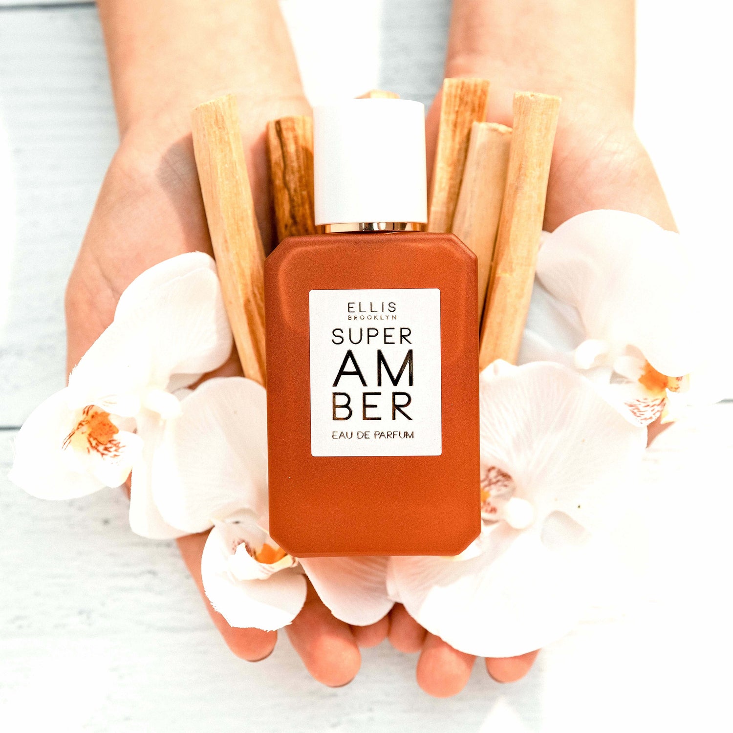 Lifestyle image of Ellis Brooklyn Super Amber Eau de Parfum variant: 1.7 fl oz