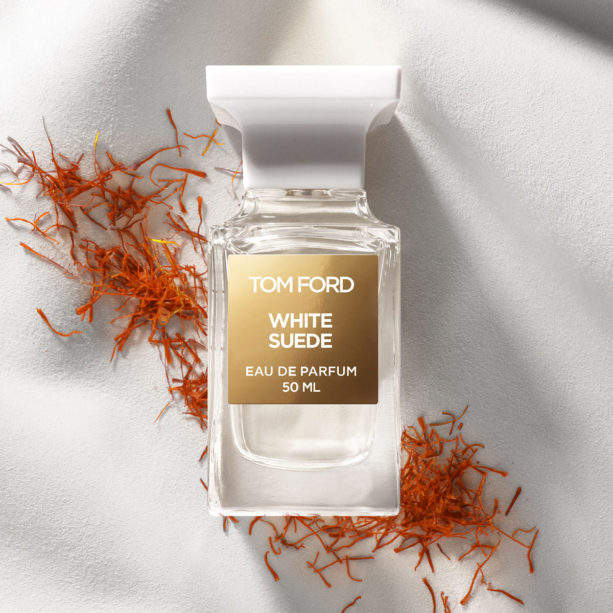Lifestyle image of Tom Ford White Suede Eau de Parfum Spray variant: 1 fl oz