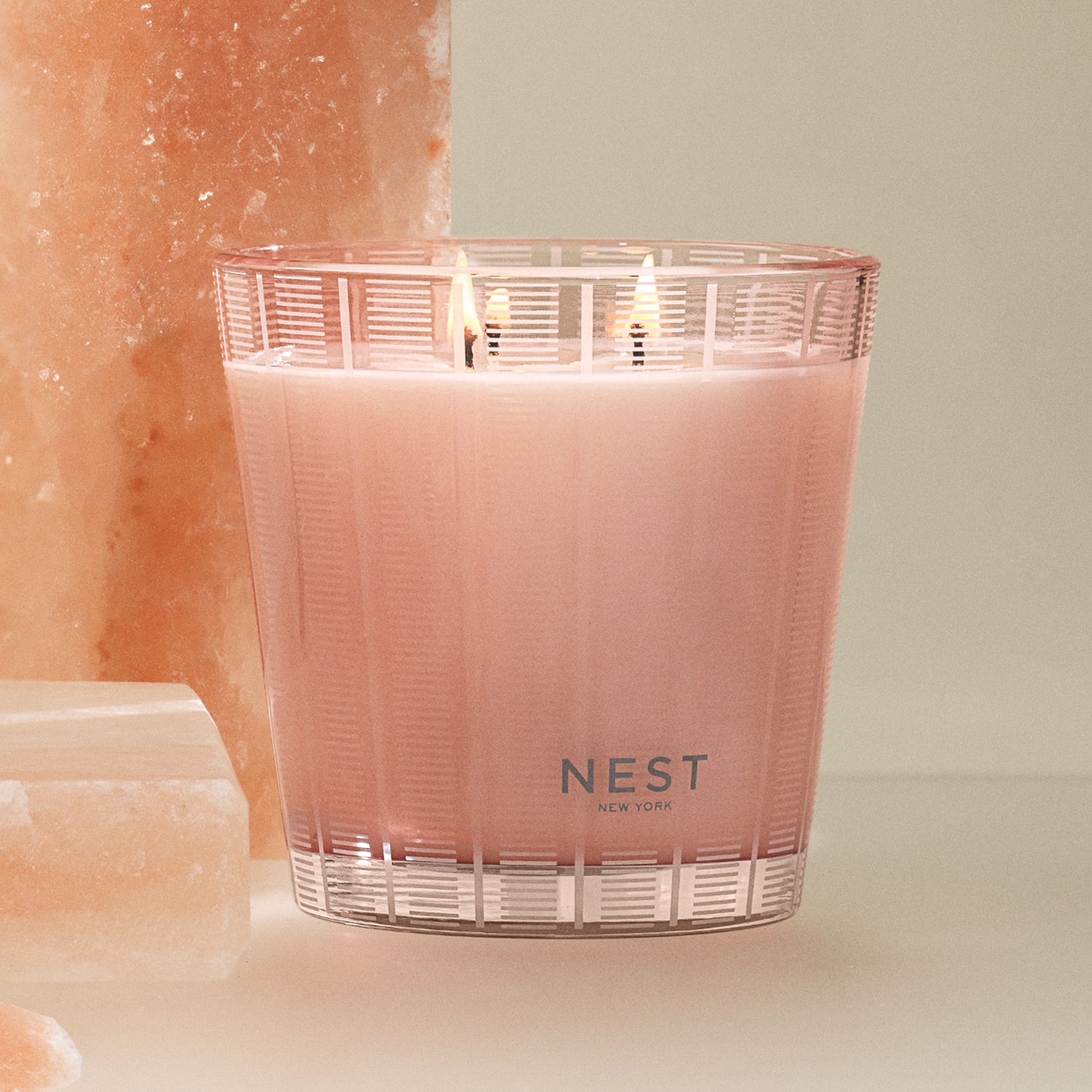 Lifestyle image of Nest Himalayan Salt & Rosewater Candle variant: 21.1 oz (3-Wick)