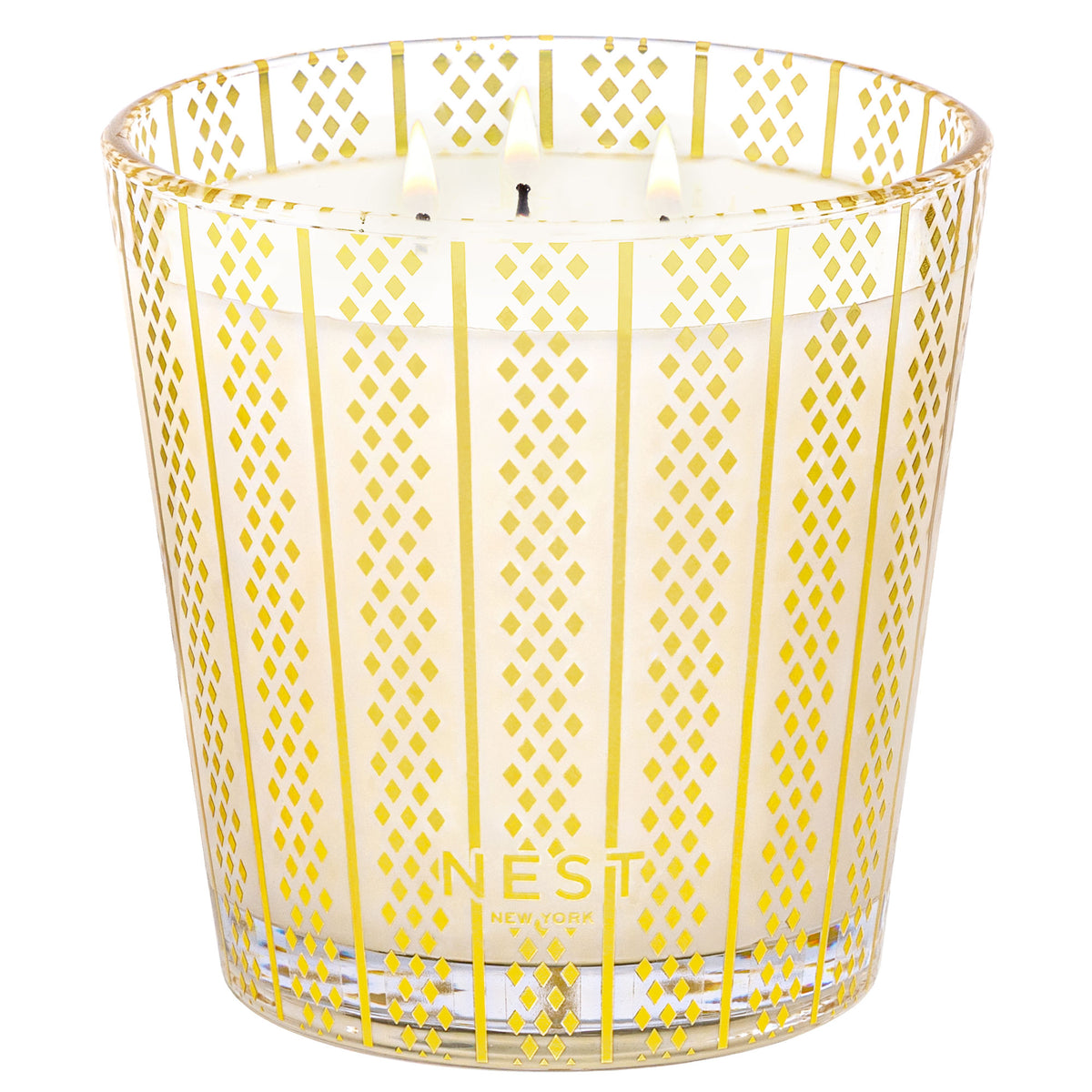 Nest New York Holiday Candle (Limited Edition) with three wicks in a clear glass vessel decorated with a gold diamond and vertical stripe pattern.