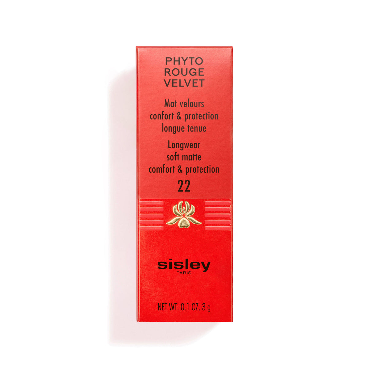 Red rectangular velvet Sisley Paris Phyto-Rouge Velvet lipstick box with product text, a small gold floral emblem, and a net weight of 0.1 oz.
