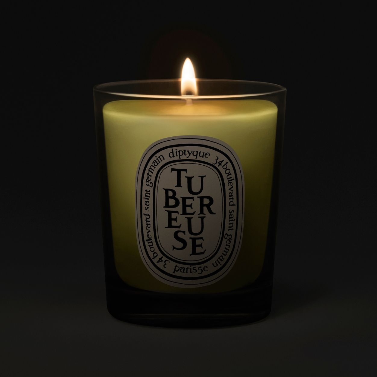 Lifestyle image of Diptyque Tubéreuse (Tuberose) Candle variant: 2.5 oz (Small)