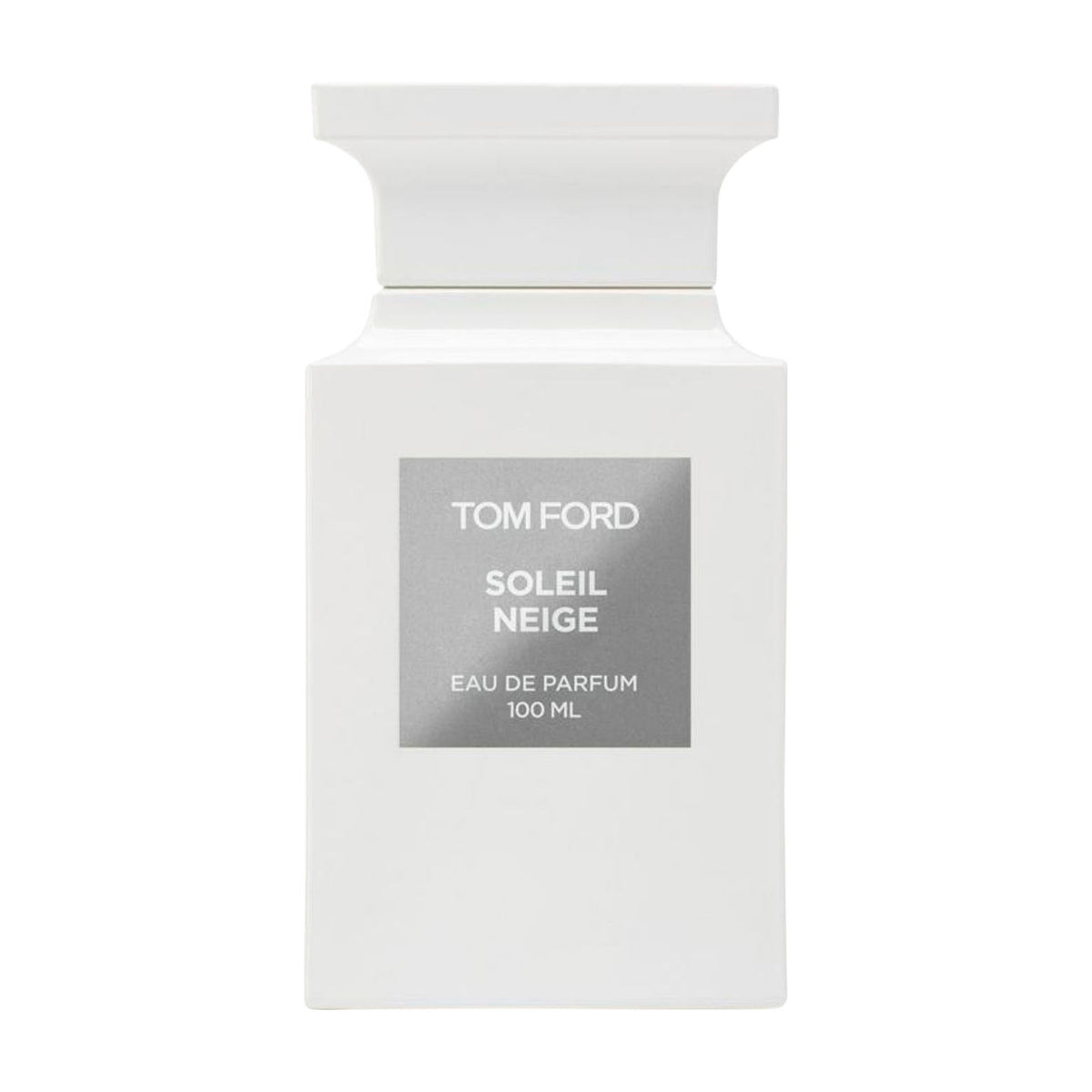 A white rectangular Tom Ford Soleil Neige Eau De Parfum bottle with a silver label, evoking the essence of sun on snow.