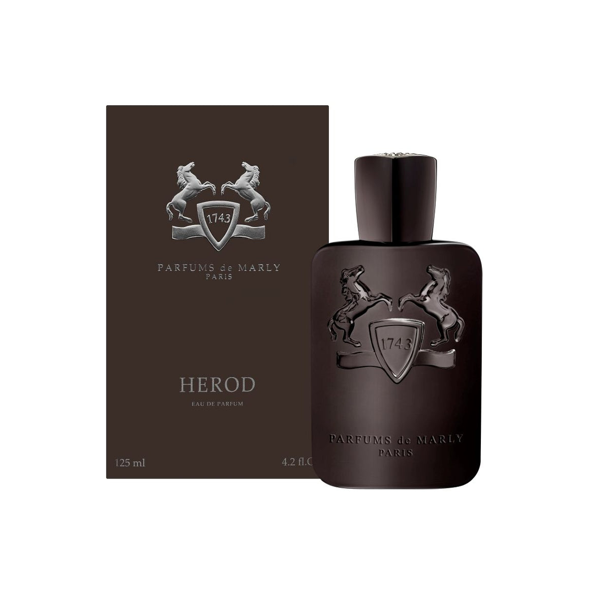 A dark brown Herod Eau de Parfum bottle and matching rectangular box, featuring an emblem of two rearing horses flanking a shield with the number 1743, evoking notes of cinnamon and vanilla.