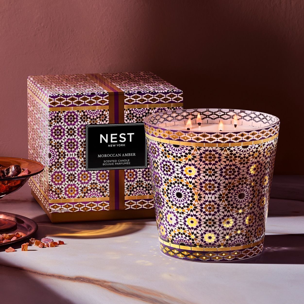 Lifestyle image of Nest Moroccan Amber Specialty Candle variant: 47.3 oz (Luxury)