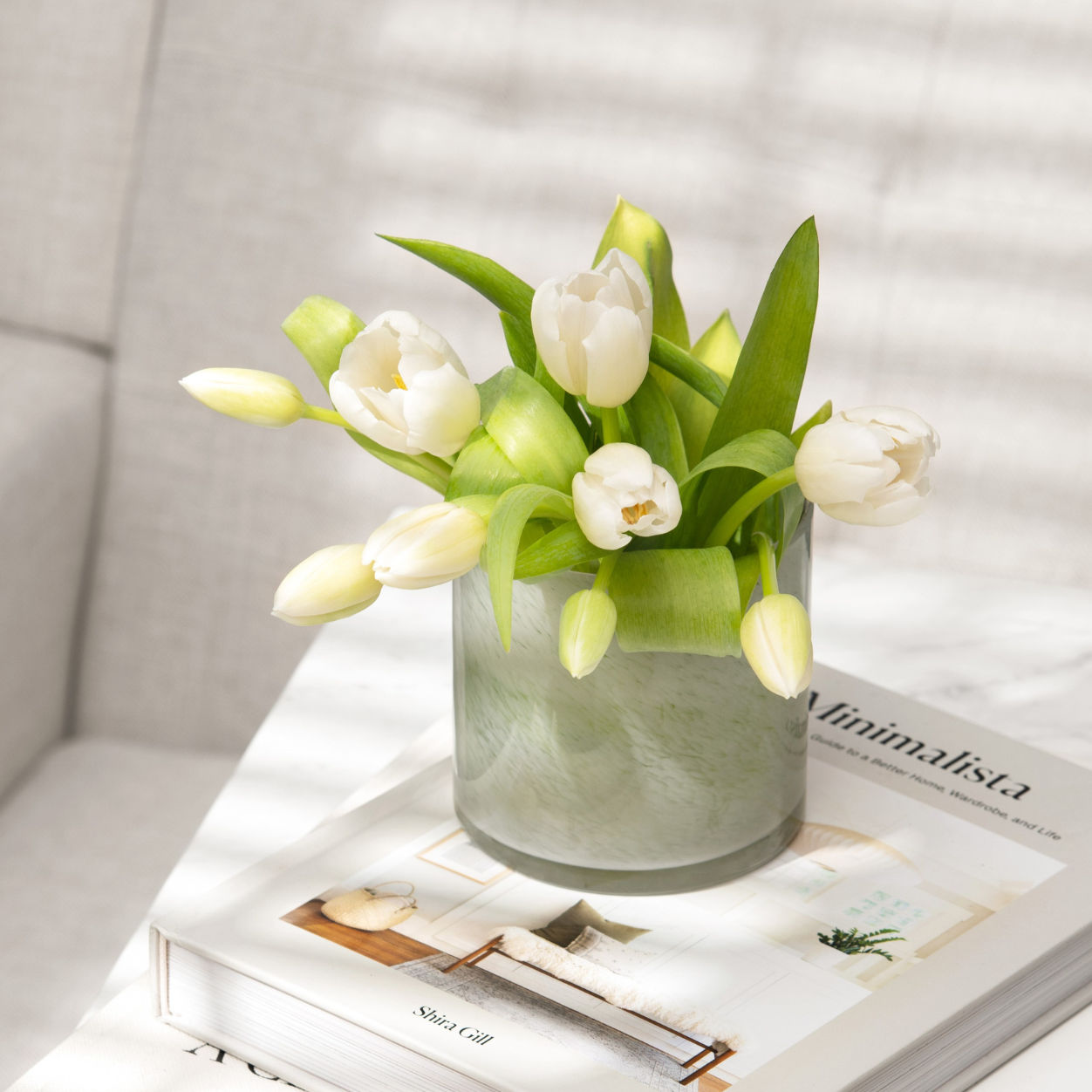 Lifestyle image of Lafco Fresh Cut Gardenia Candle variant: 6.5 oz (Classic)