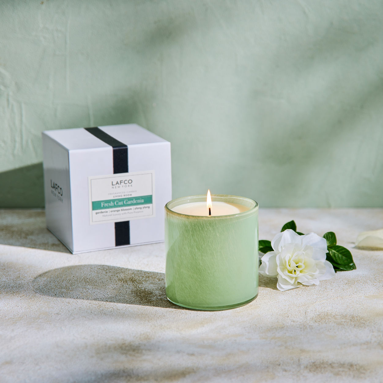 Lifestyle image of Lafco Fresh Cut Gardenia Candle variant: 6.5 oz (Classic)