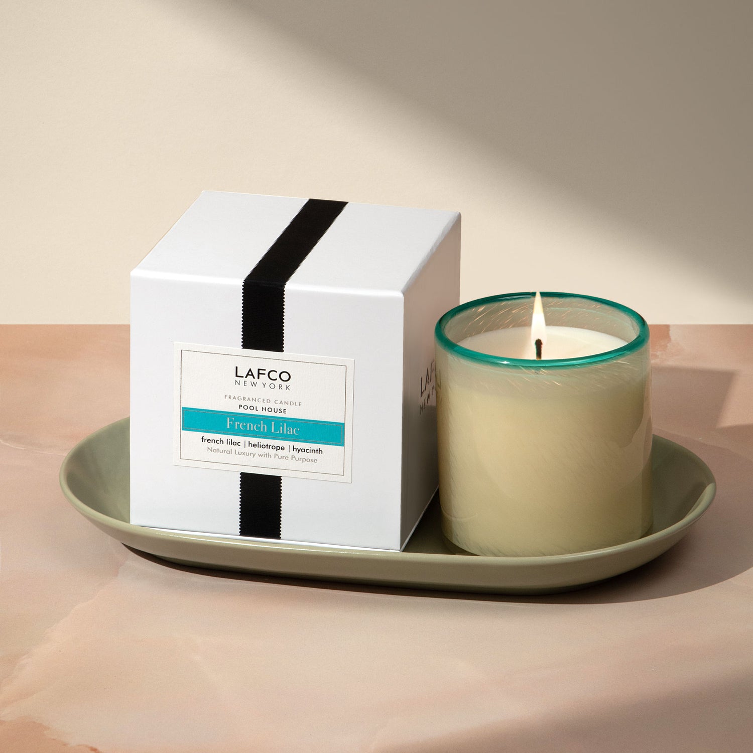 Lifestyle image of Lafco French Lilac Candle variant: 15.5 oz (Signature)
