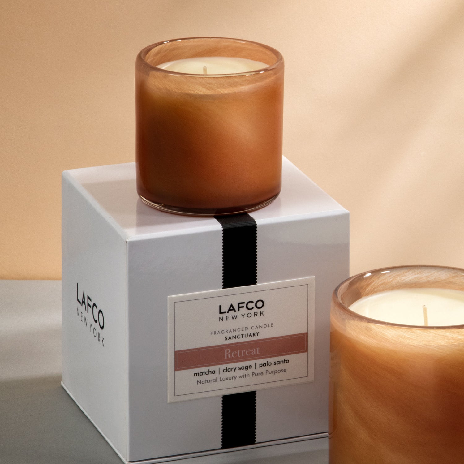 Lifestyle image of Lafco Retreat Candle variant: 6.5 oz (Classic)