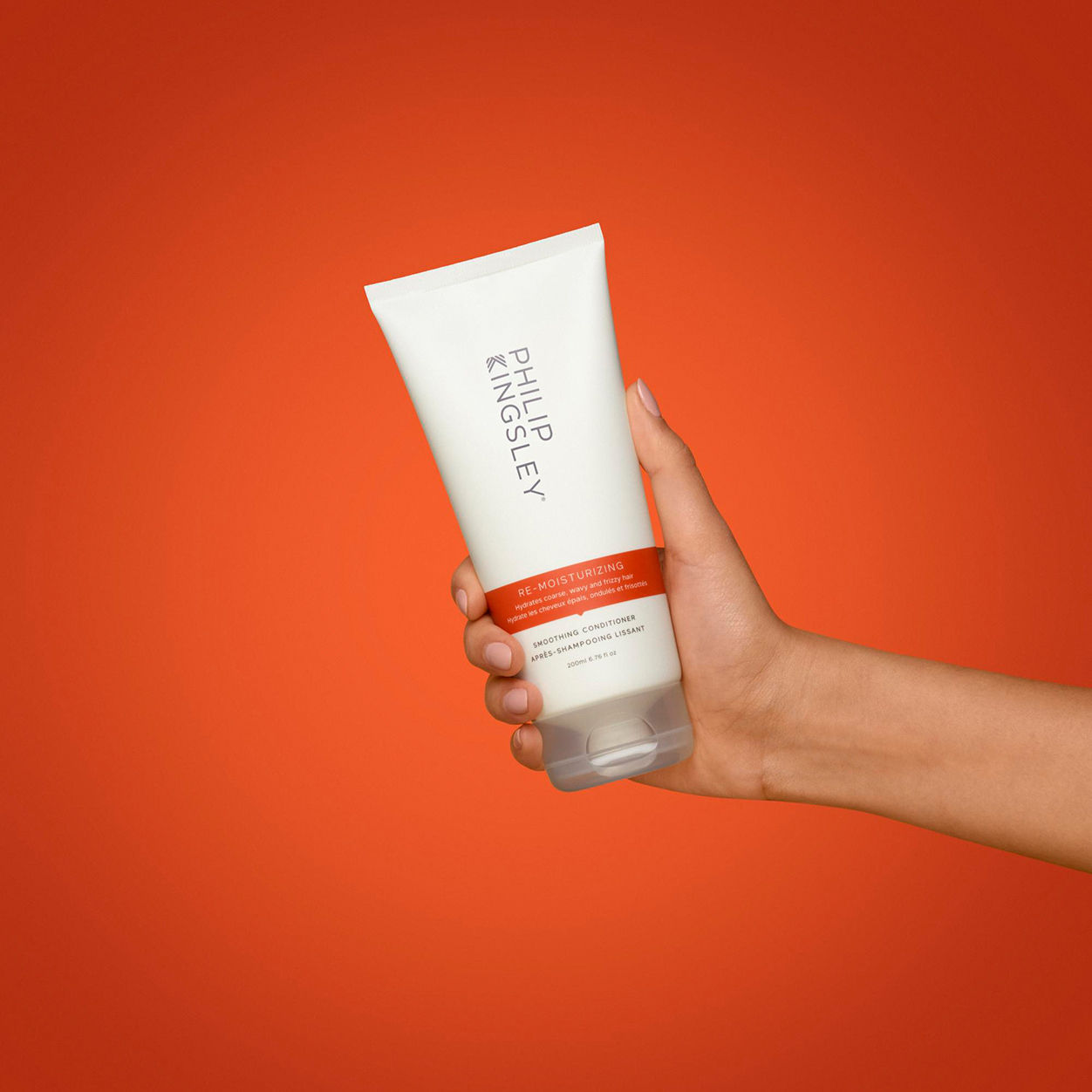 Lifestyle image of Philip Kingsley Re-Moisturizing Smoothing Conditioner variant: 6.76 fl oz