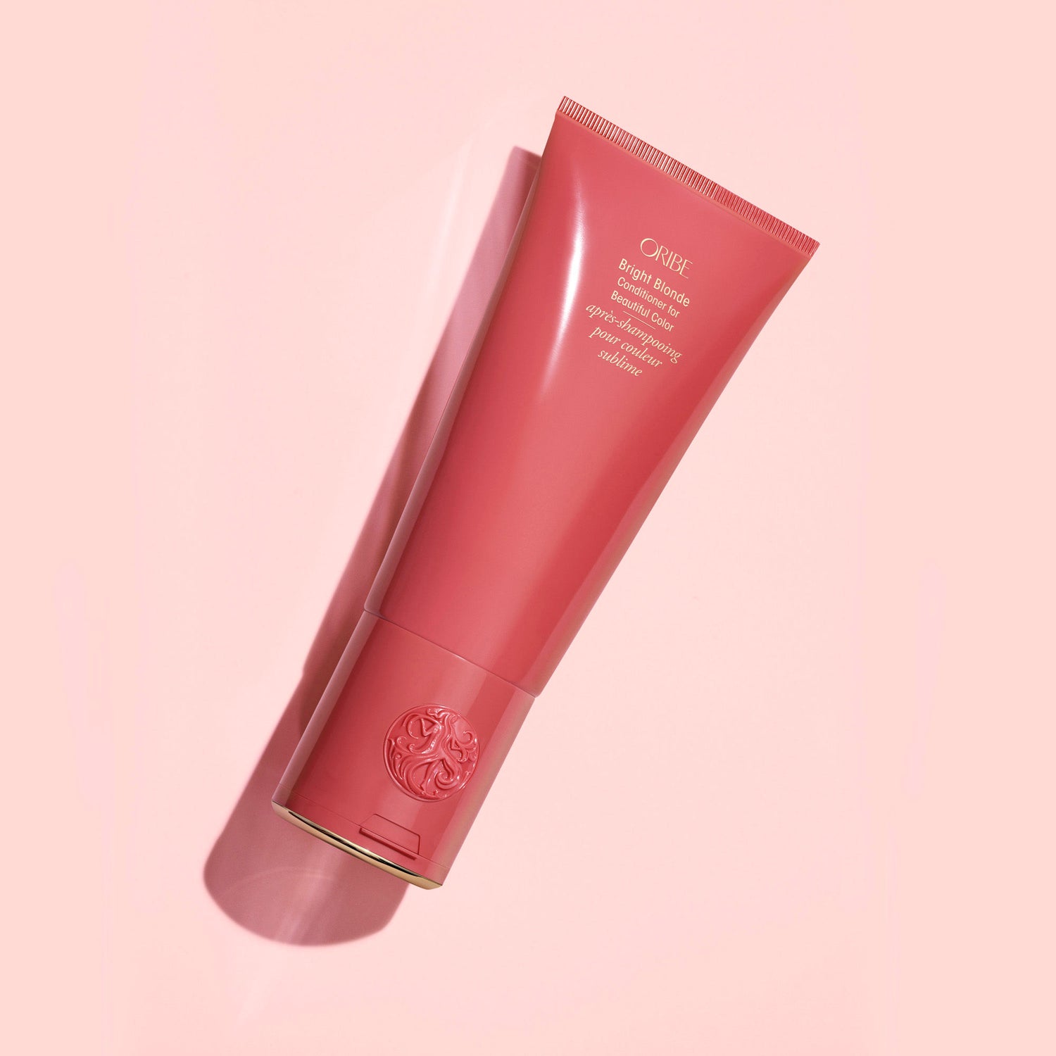 Lifestyle image of Oribe Bright Blonde For Beautiful Color Conditioner variant: 6.8 oz
