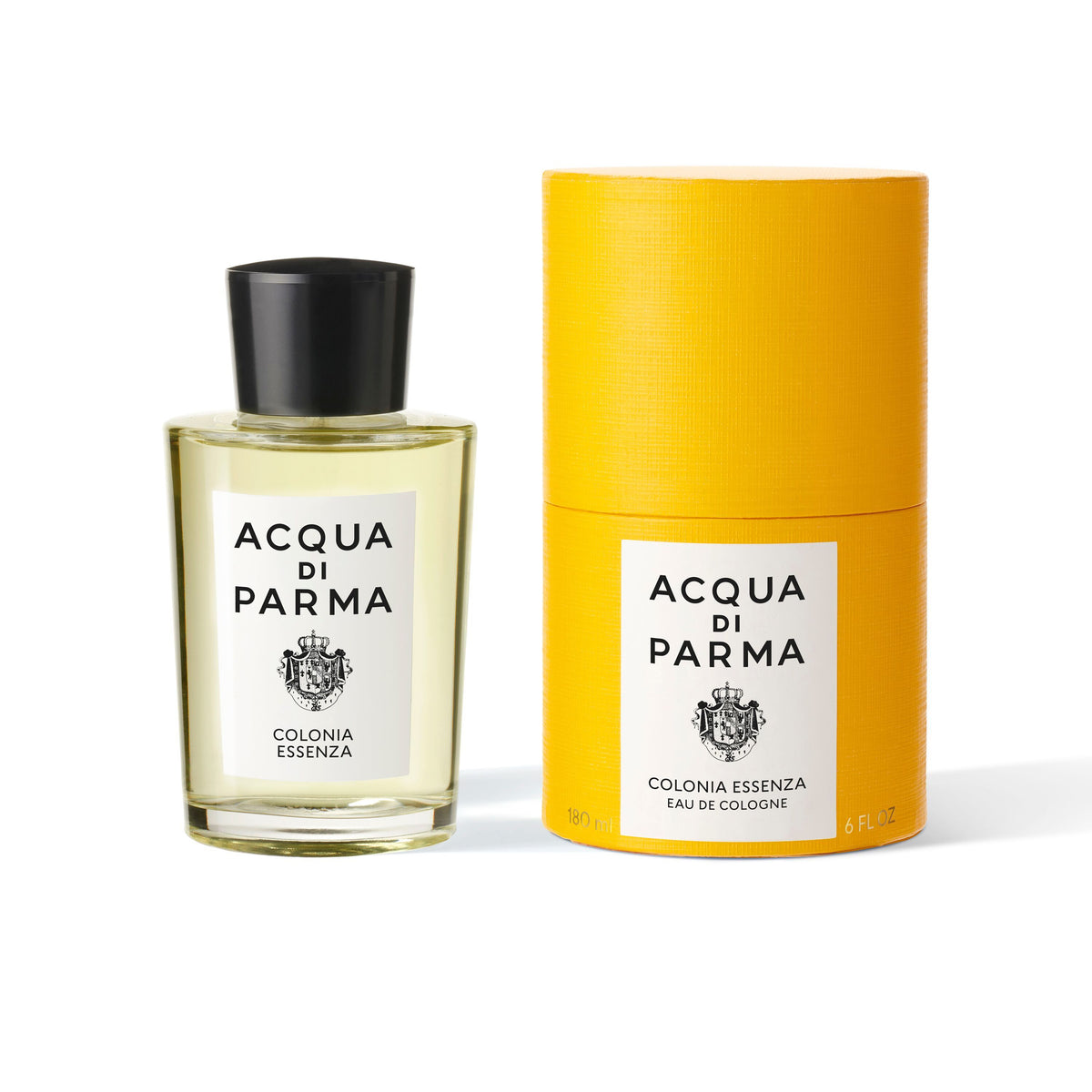 A glass bottle of Acqua di Parma Colonia Essenza Eau de Cologne with a black cap sits next to its yellow cylindrical box, both featuring white labels with black text and a crest that reflects a modern classic fragrance.
