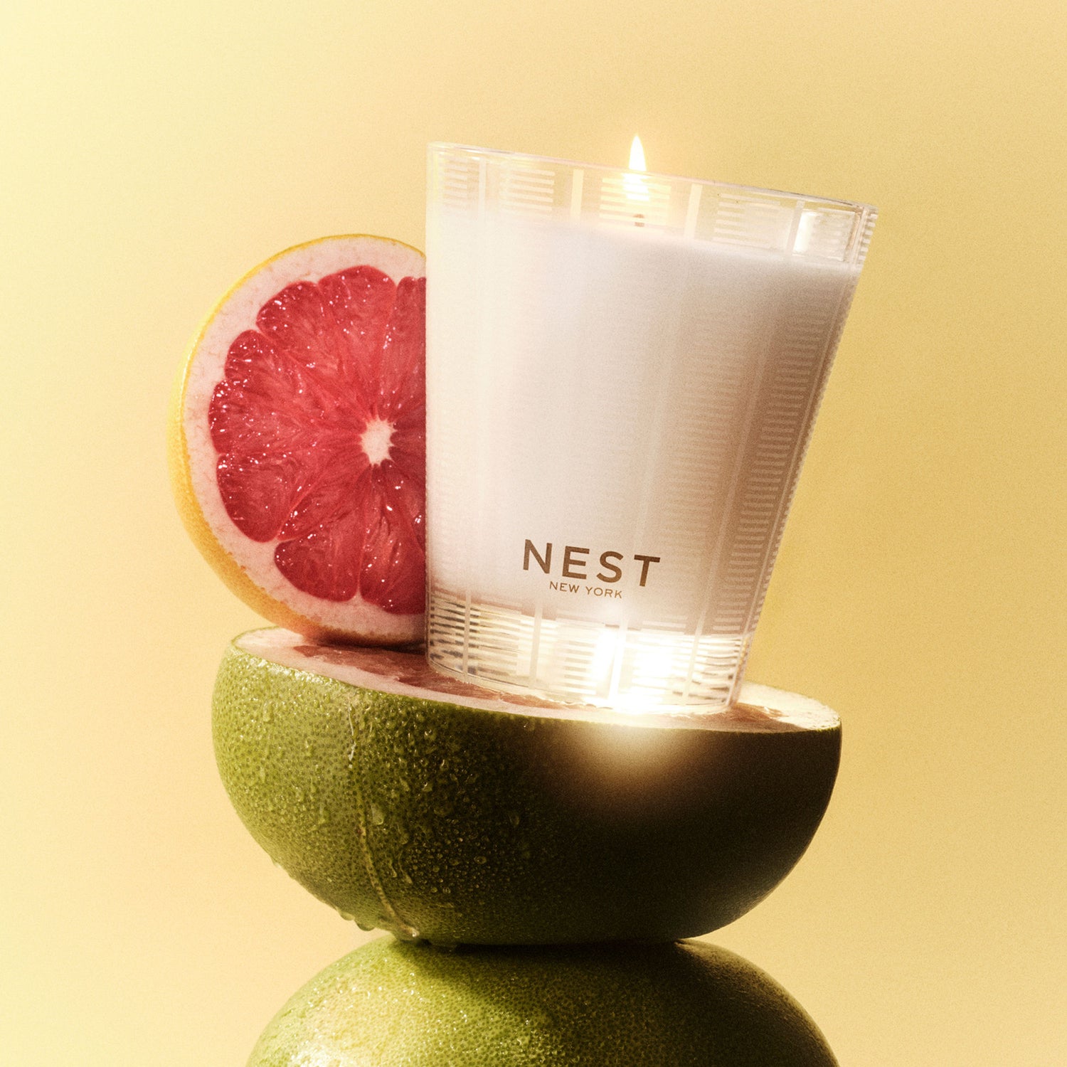 Lifestyle image of Nest Grapefruit Candle variant: 8.1 oz (Classic)