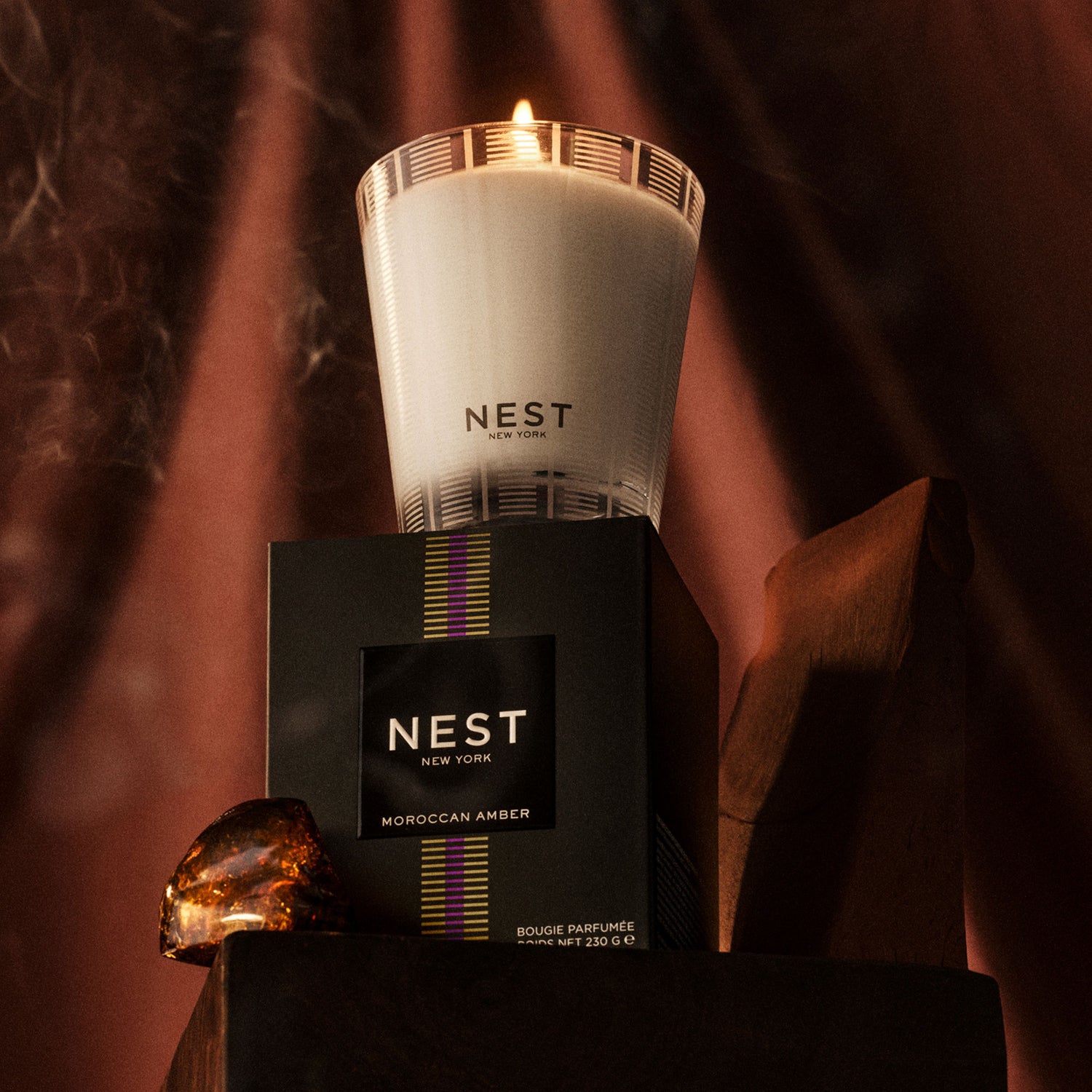 Lifestyle image of Nest Moroccan Amber Candle variant: 8.1 oz (Classic)