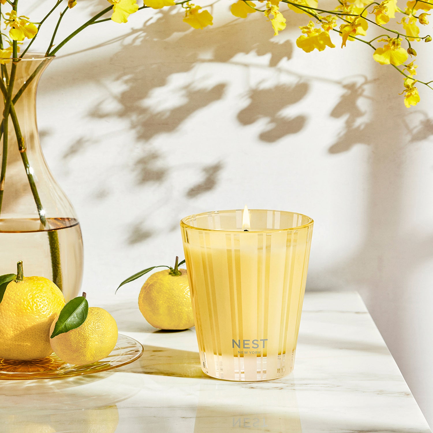 Nest Sunlit Yuzu and Neroli Candle Size variant: 8.1 oz (Classic) lifestyle image 2 .
