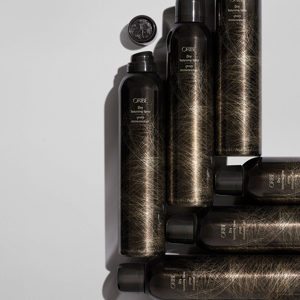 Lifestyle image of Oribe Dry Texturizing Spray variant: 8.5 oz