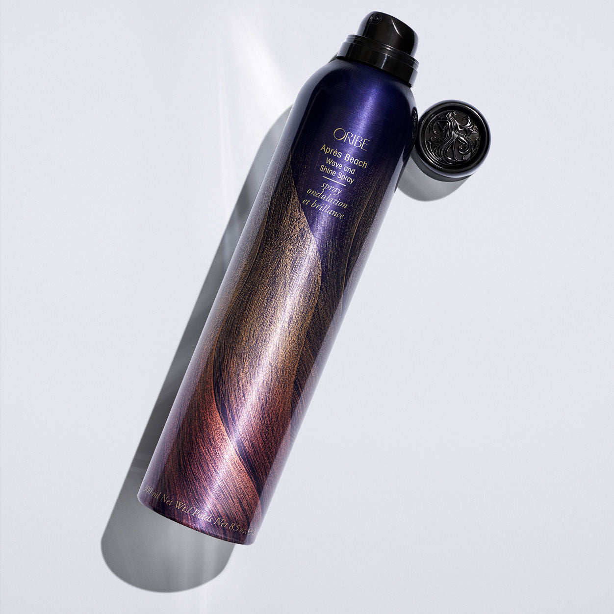 Lifestyle image of Oribe Après Beach Wave and Shine Spray variant: 8.5 oz