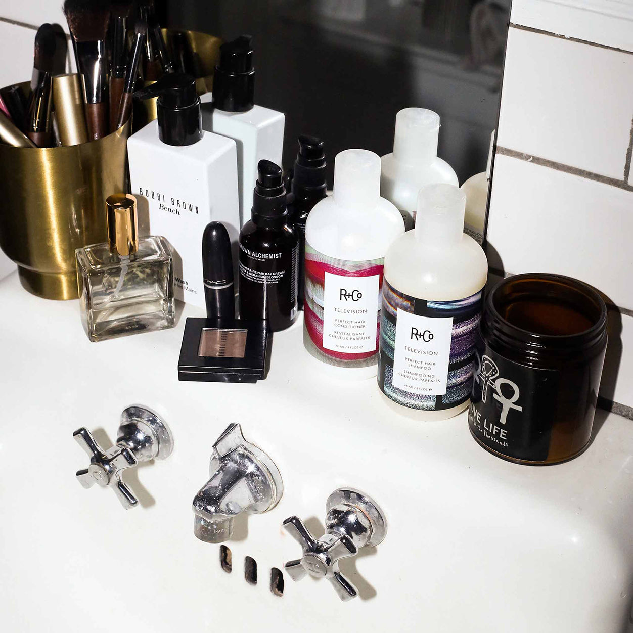 Lifestyle image of R+Co Television Perfect Hair Conditioner variant: 8 fl oz