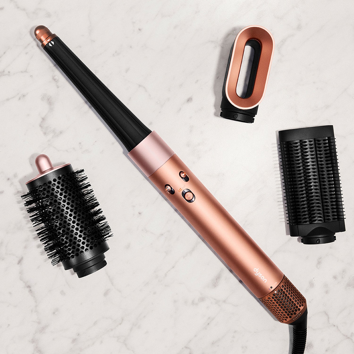 Lifestyle image of Dyson Airwrap i.d. Multi-Styler and Dryer Straight+Wavy variant: Amber Silk (Limited Edition)