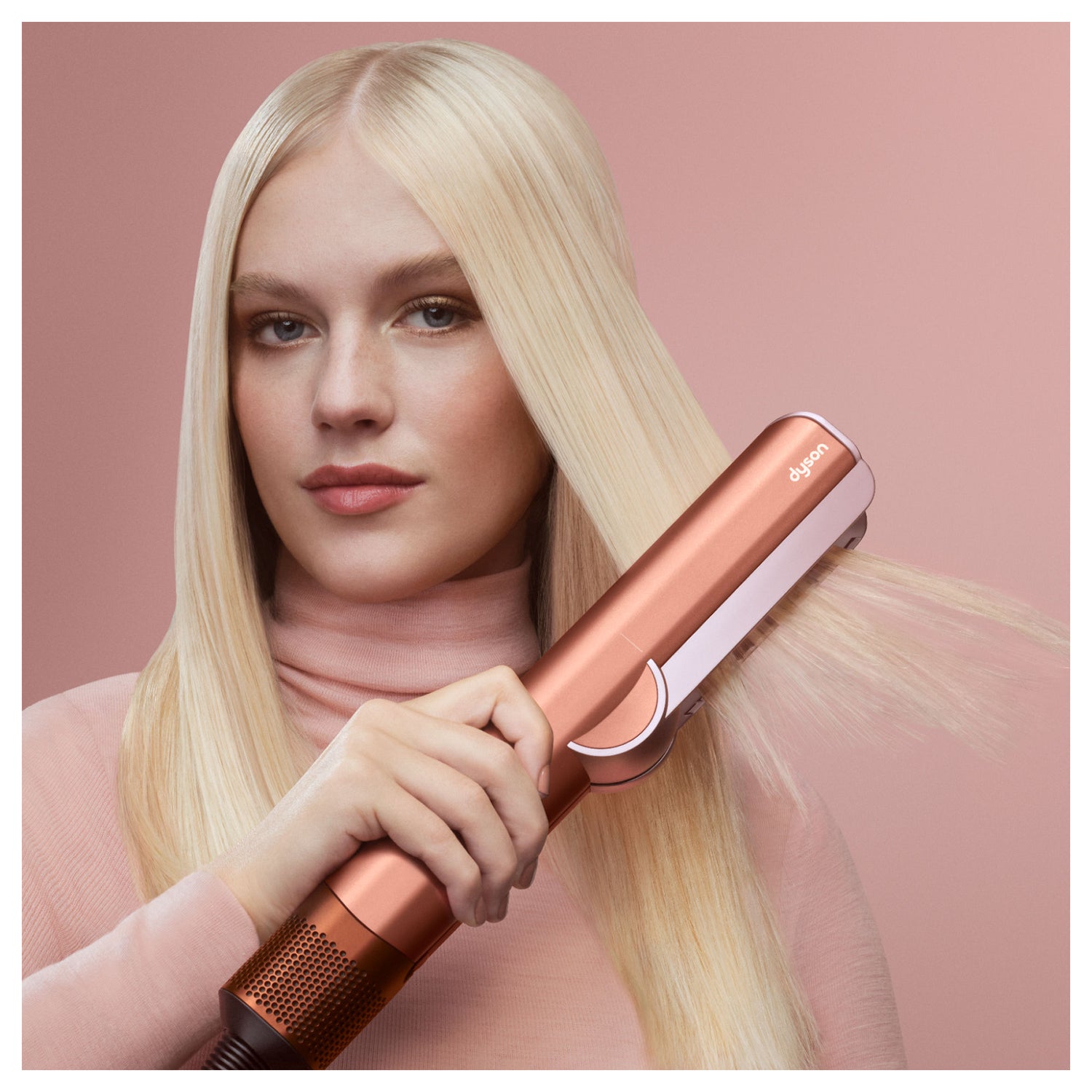 Lifestyle image of Dyson Airstrait Straightener variant: Amber Silk (Limited Edition)