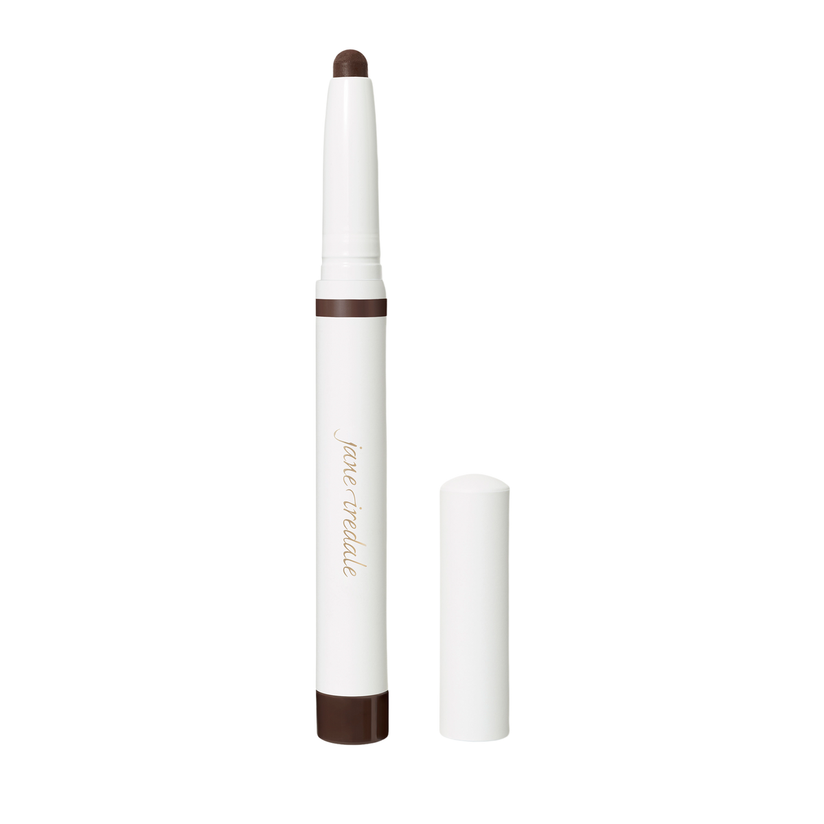 Brown Jane Iredale ColorLuxe Eye Shadow Stick in a white twist-up casing with its matching cap removed and standing beside it.