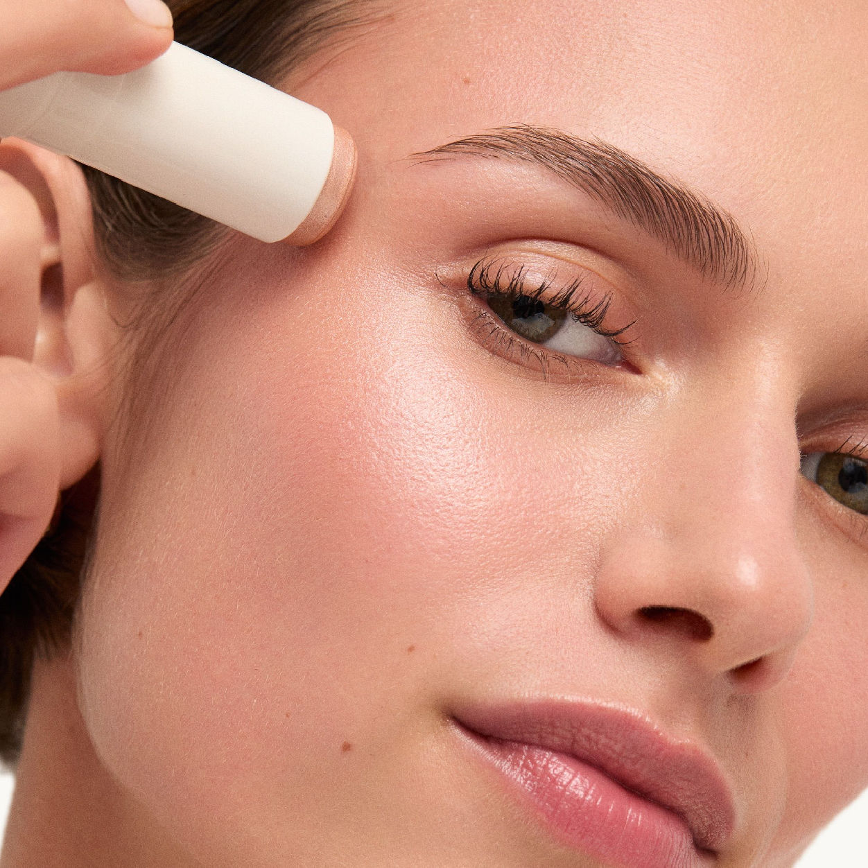 Model image of Goop Glow Skin Highlighter Stick variant: Aura