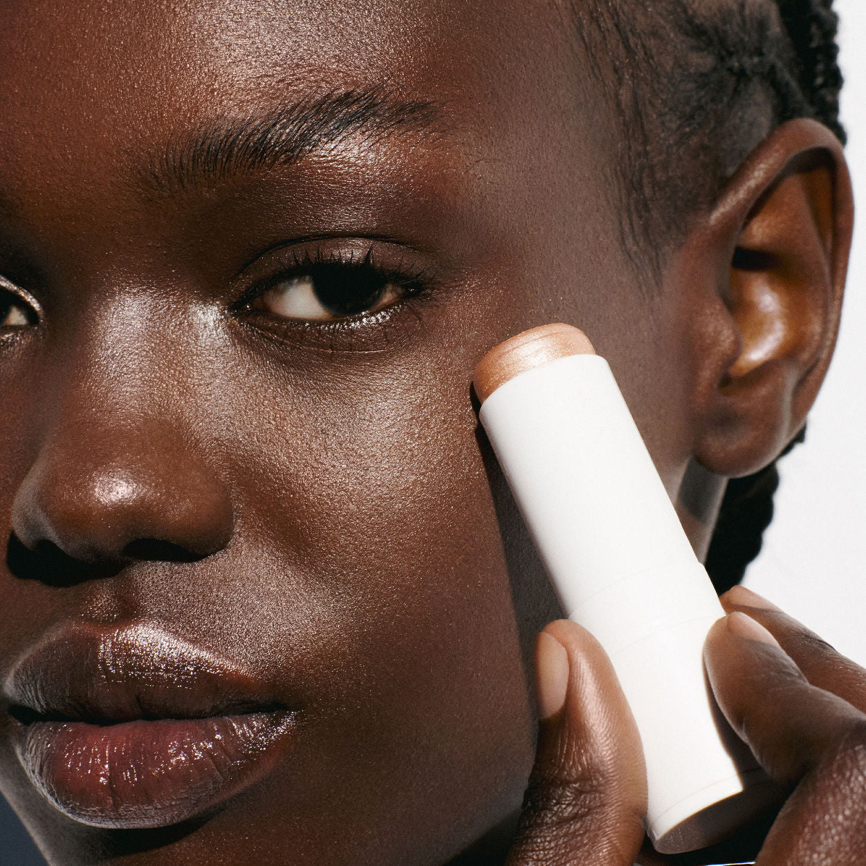 Model image of Goop Glow Skin Highlighter Stick variant: Aura