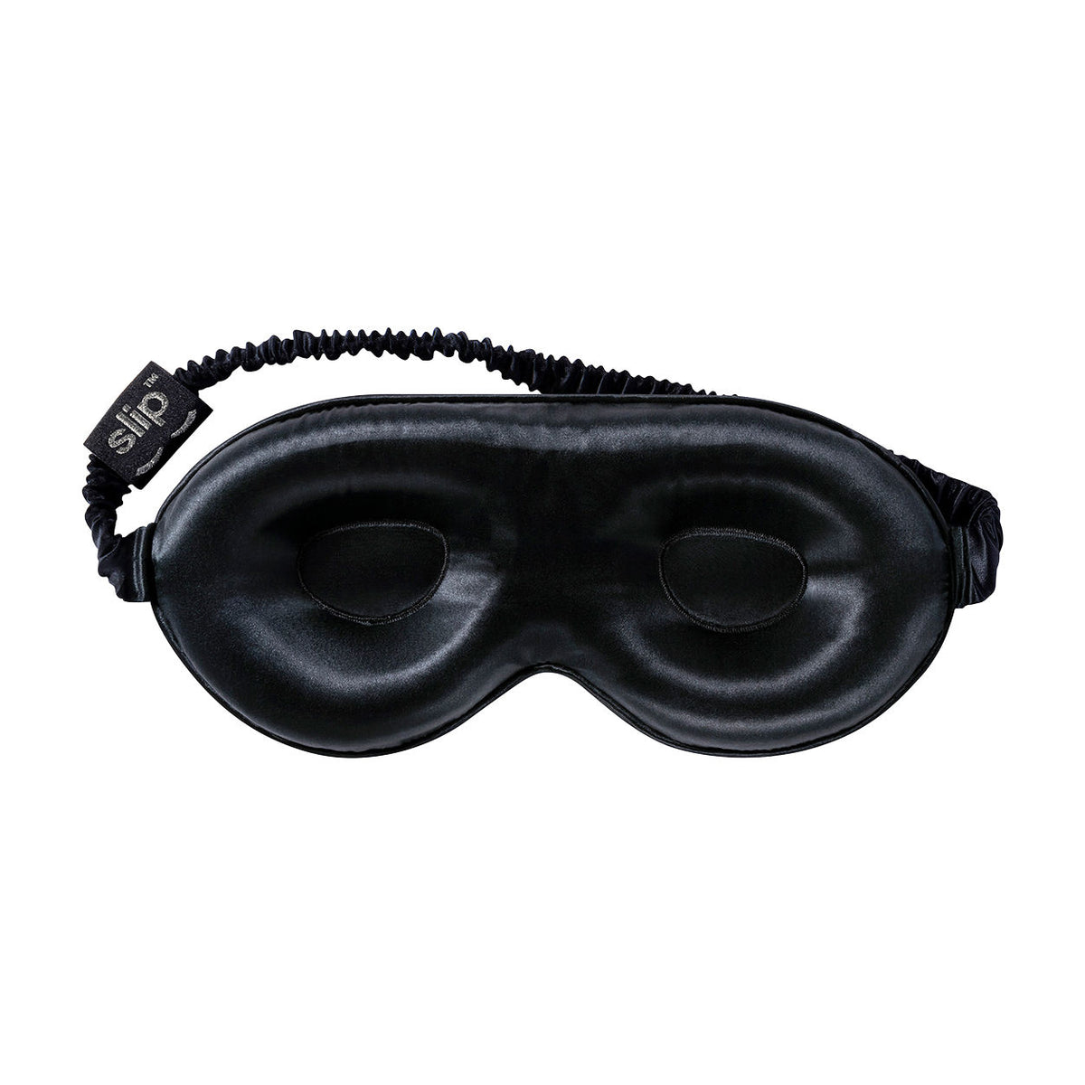 Black Slip Pure Silk Contour Sleep Mask featuring an elastic strap and a small branded tag, designed to provide beauty sleep.