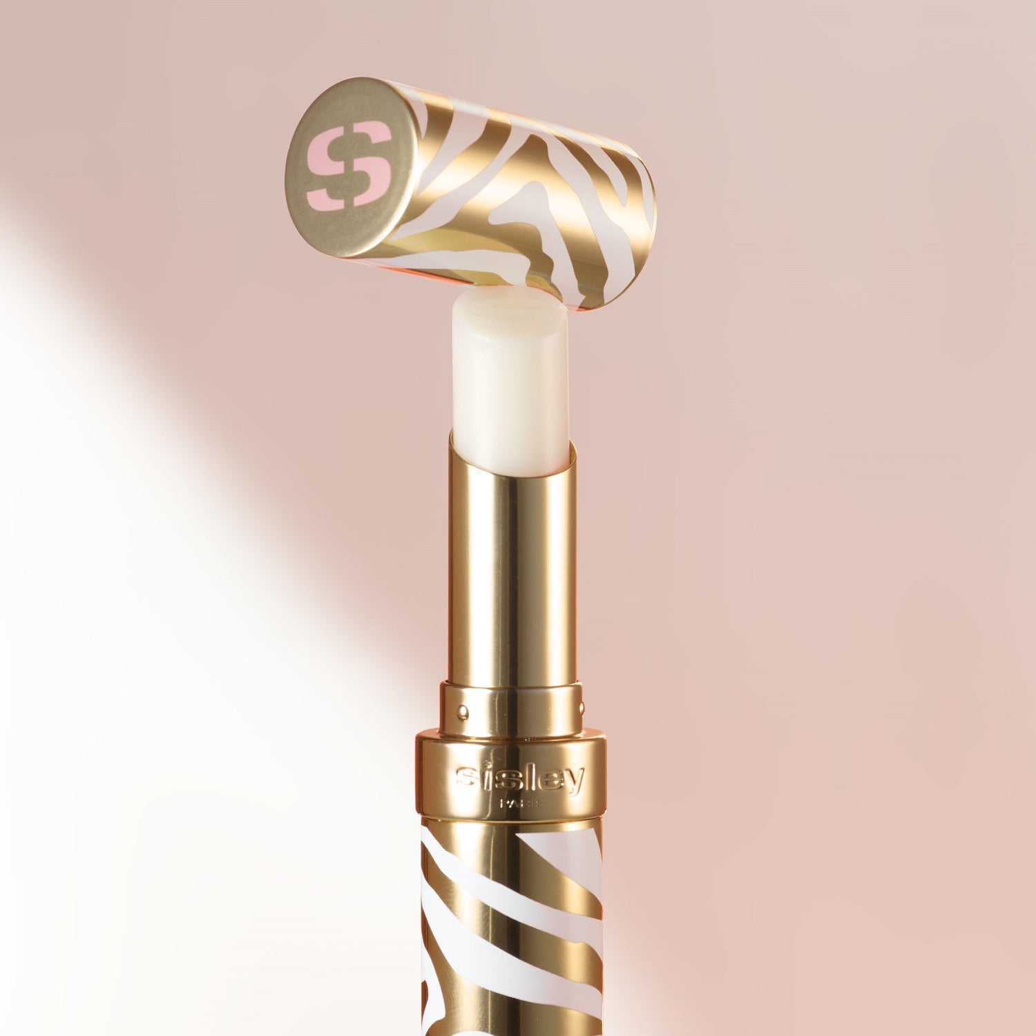 Lifestyle image of Sisley-Paris Phyto-Lip Balm variant: Cloud
